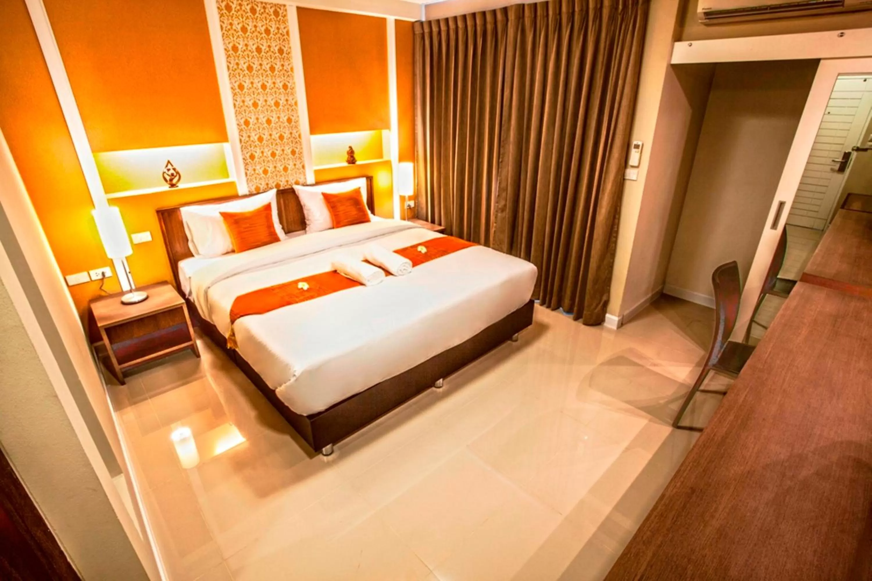 Photo of the whole room, Bed in The Aim Sathorn Hotel