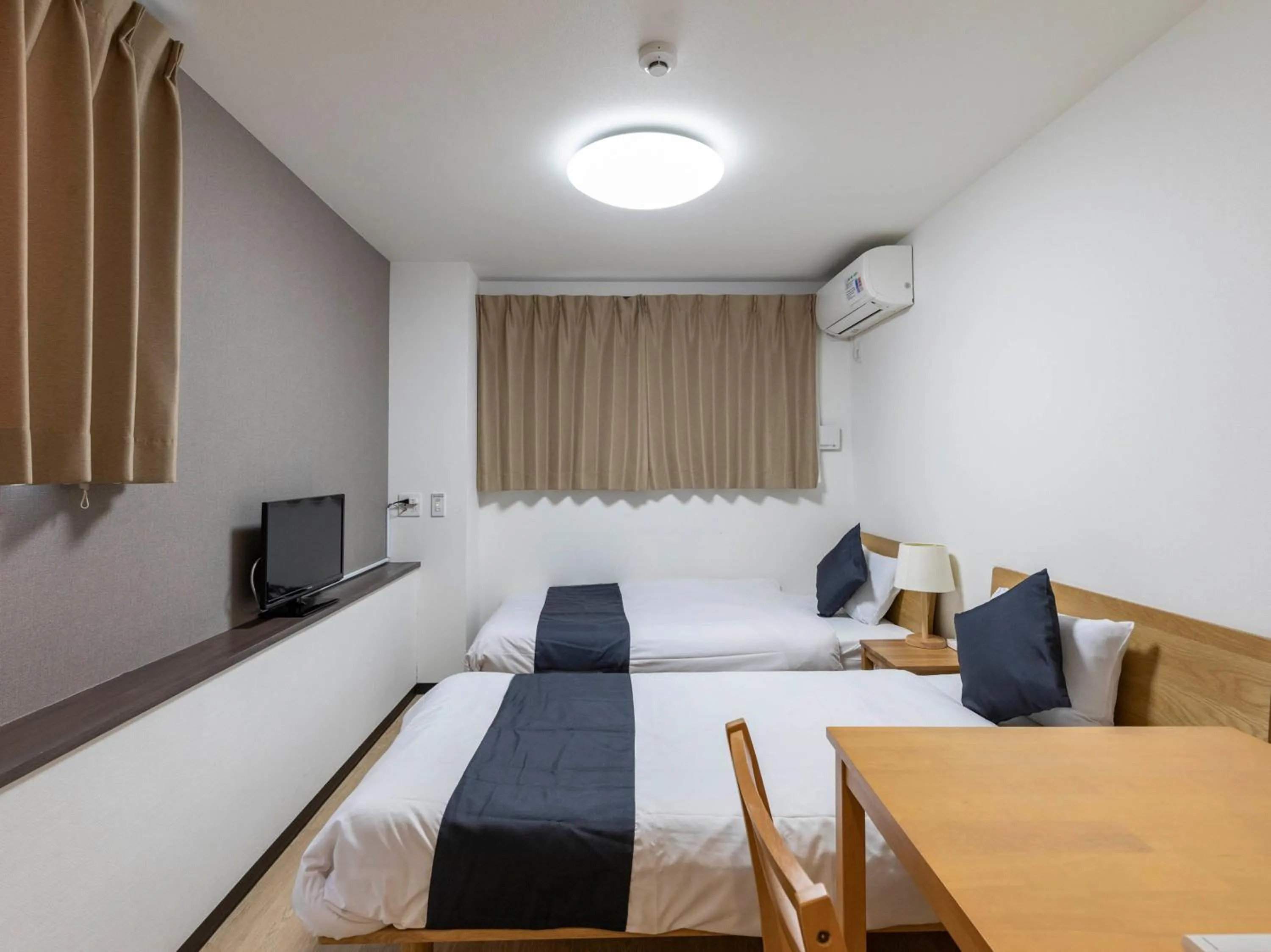 Bed in The Hotel Saint-Felicien Kyoto Shijo Karasuma