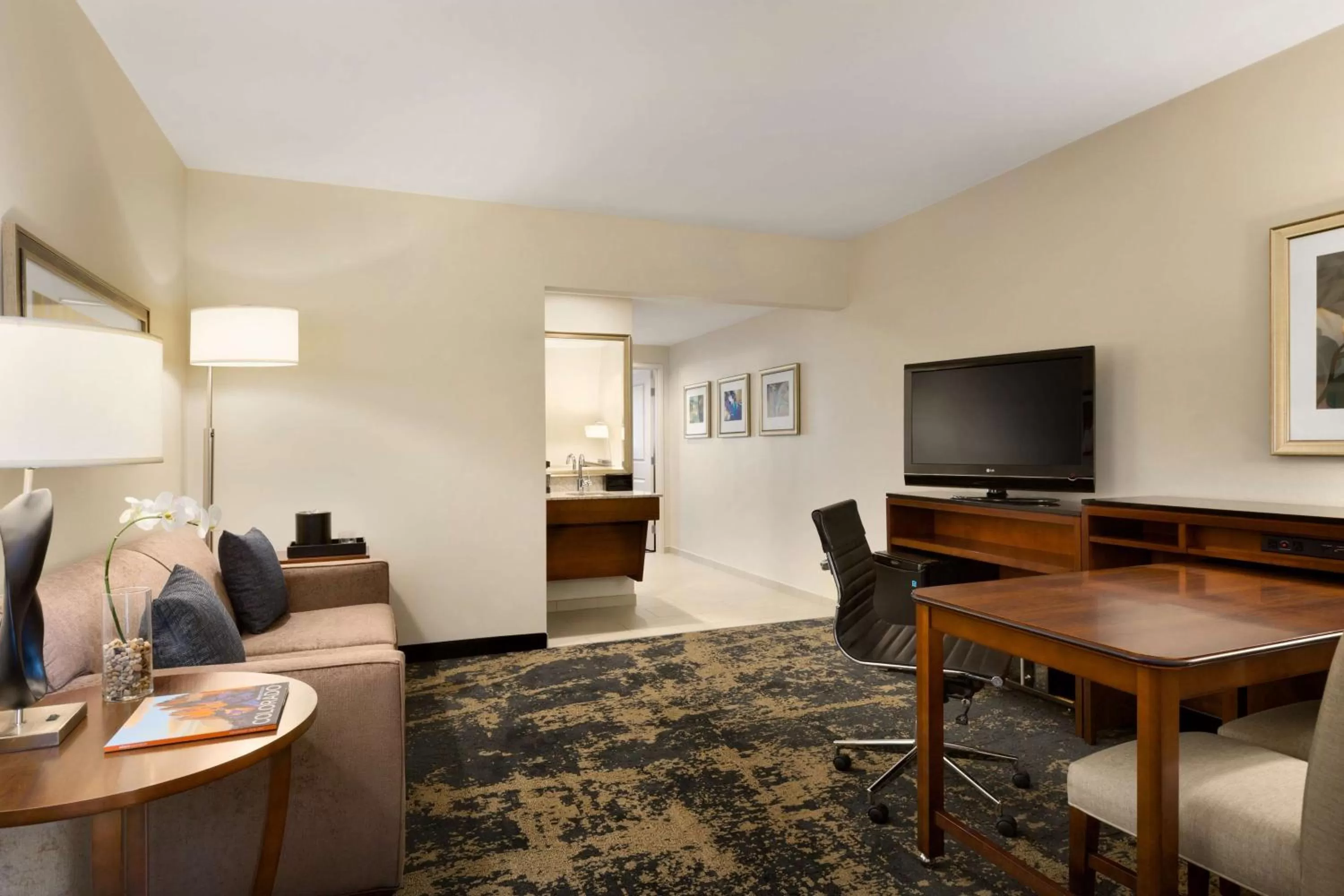 King Suite with Roll-in Shower in Embassy Suites by Hilton Denver Downtown Convention Center