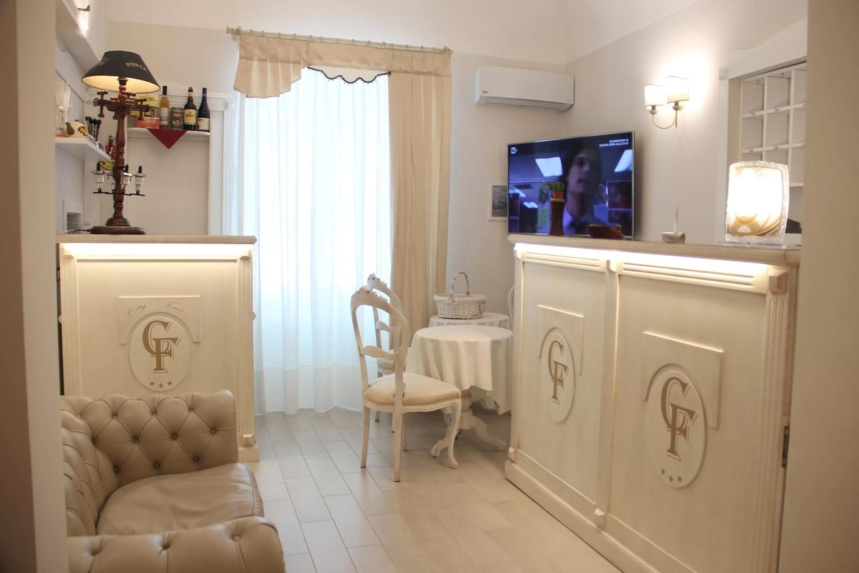 Communal lounge/ TV room in B&b Cityfair