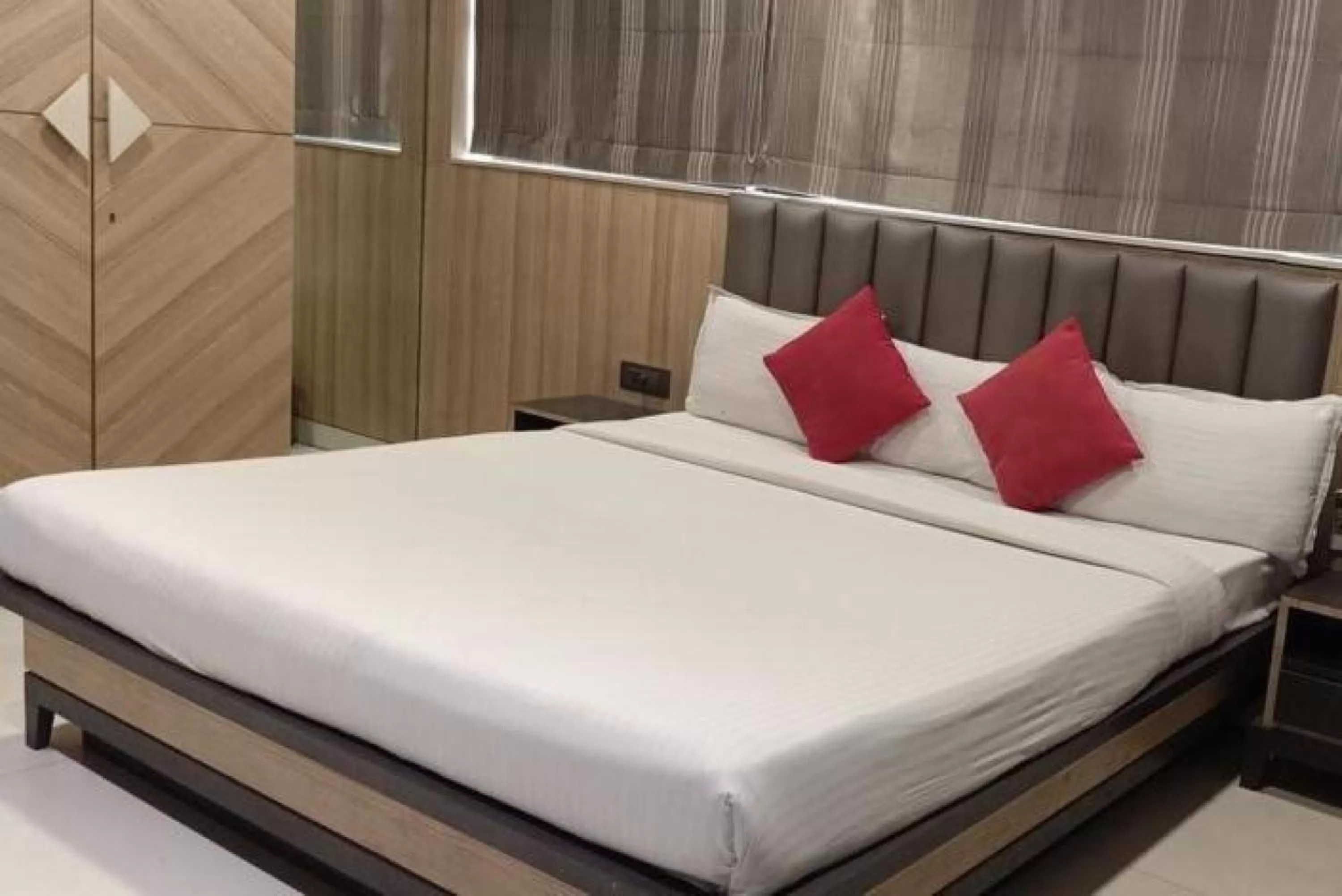 Bed in HOTEL PRATIKSHA RESIDENCY