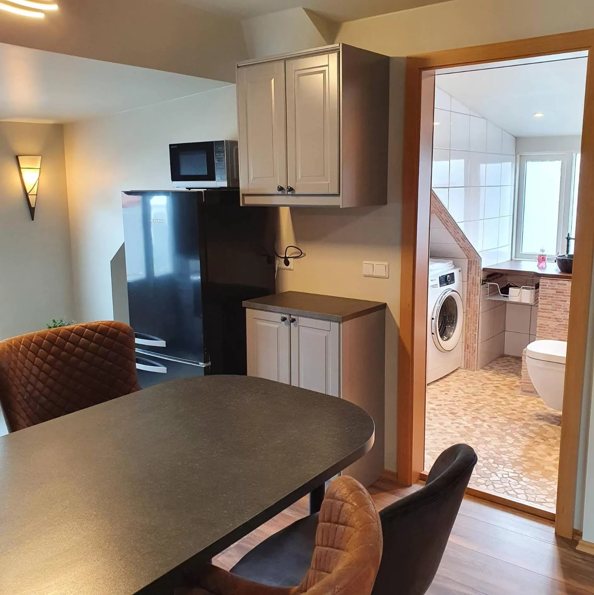 Kitchen or kitchenette in E18 Apartments