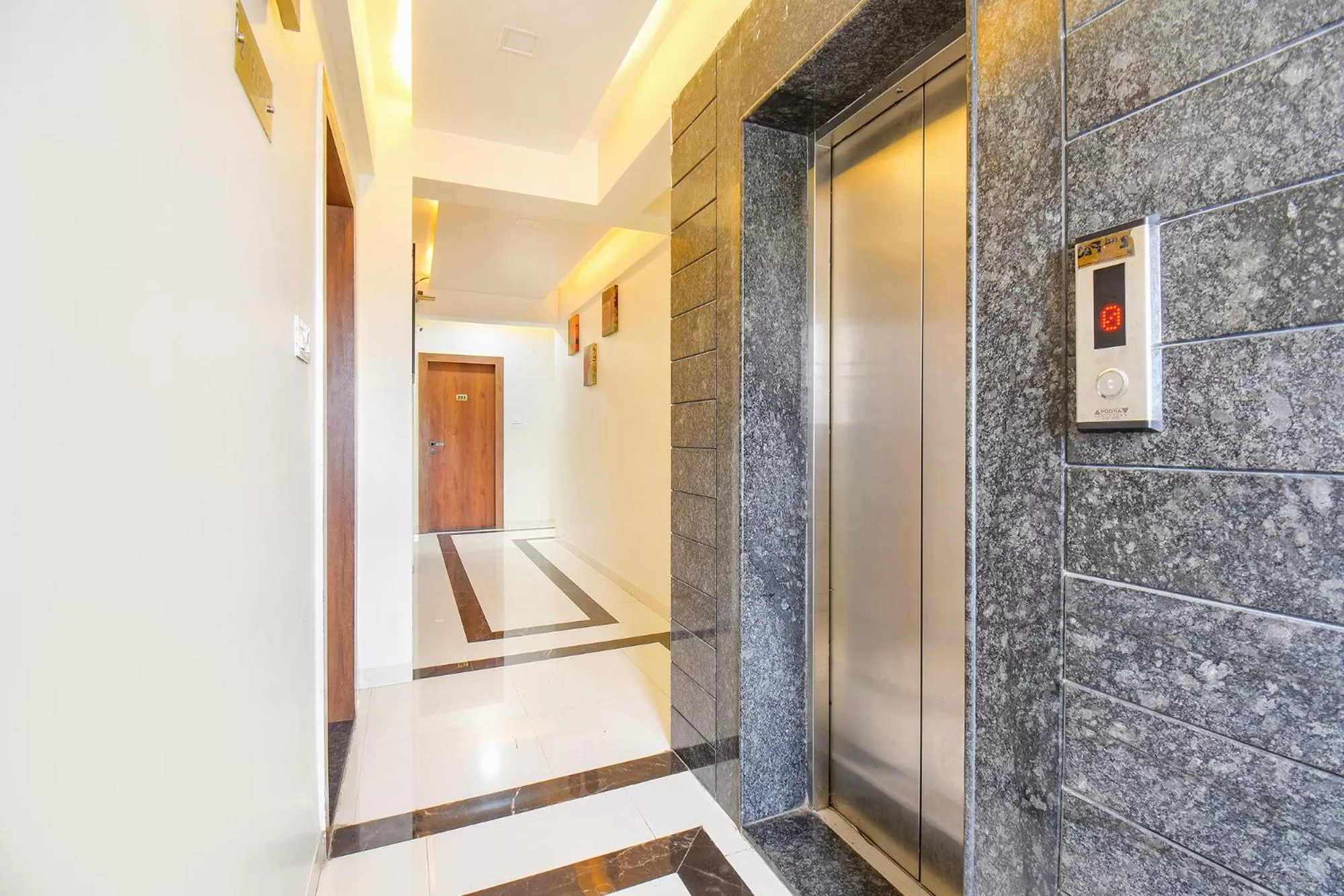 elevator in FabHotel Prime Rajmudra - Nr Butterfly Park - Hinjawadi