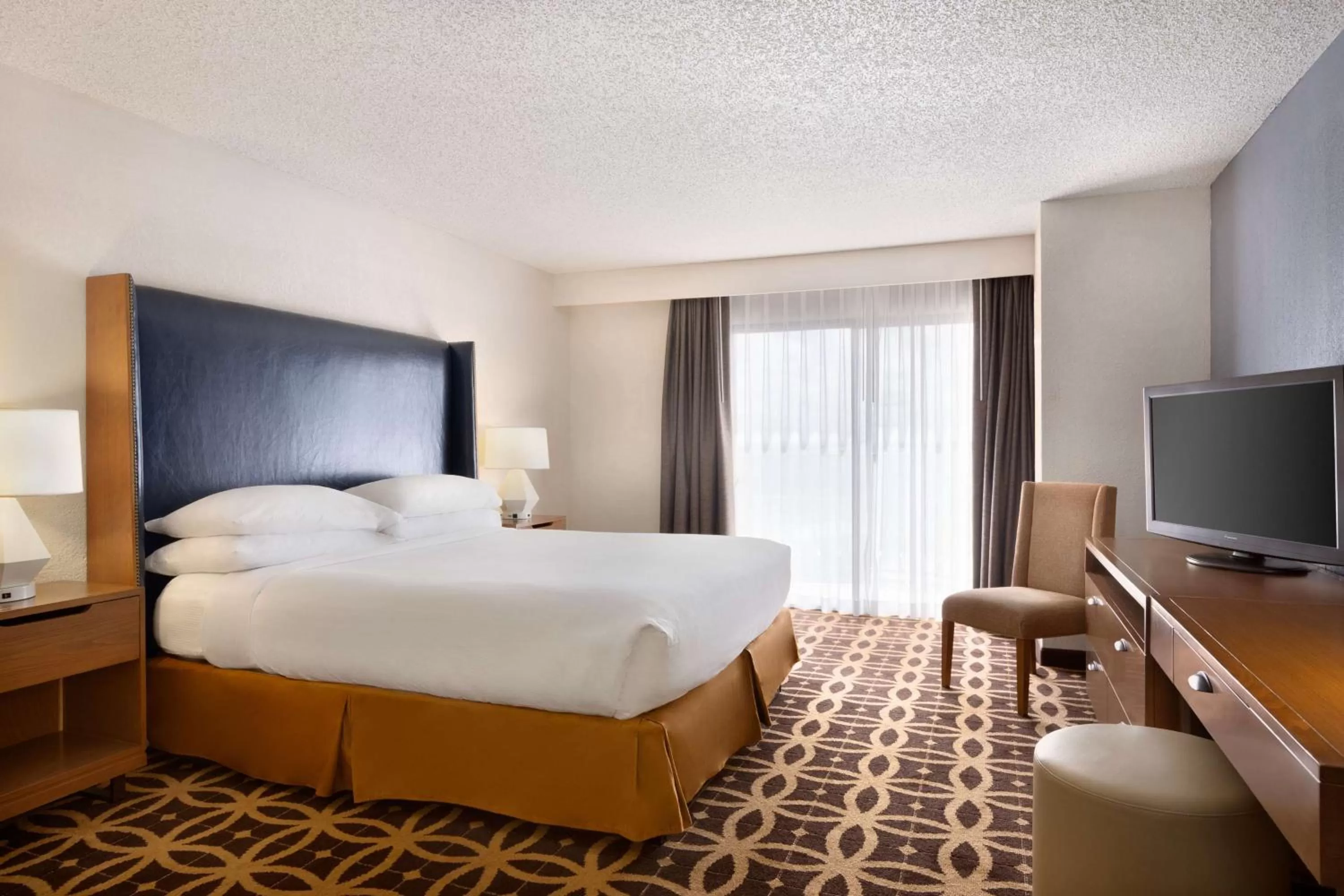 Bed in Embassy Suites by Hilton Dallas DFW Airport South