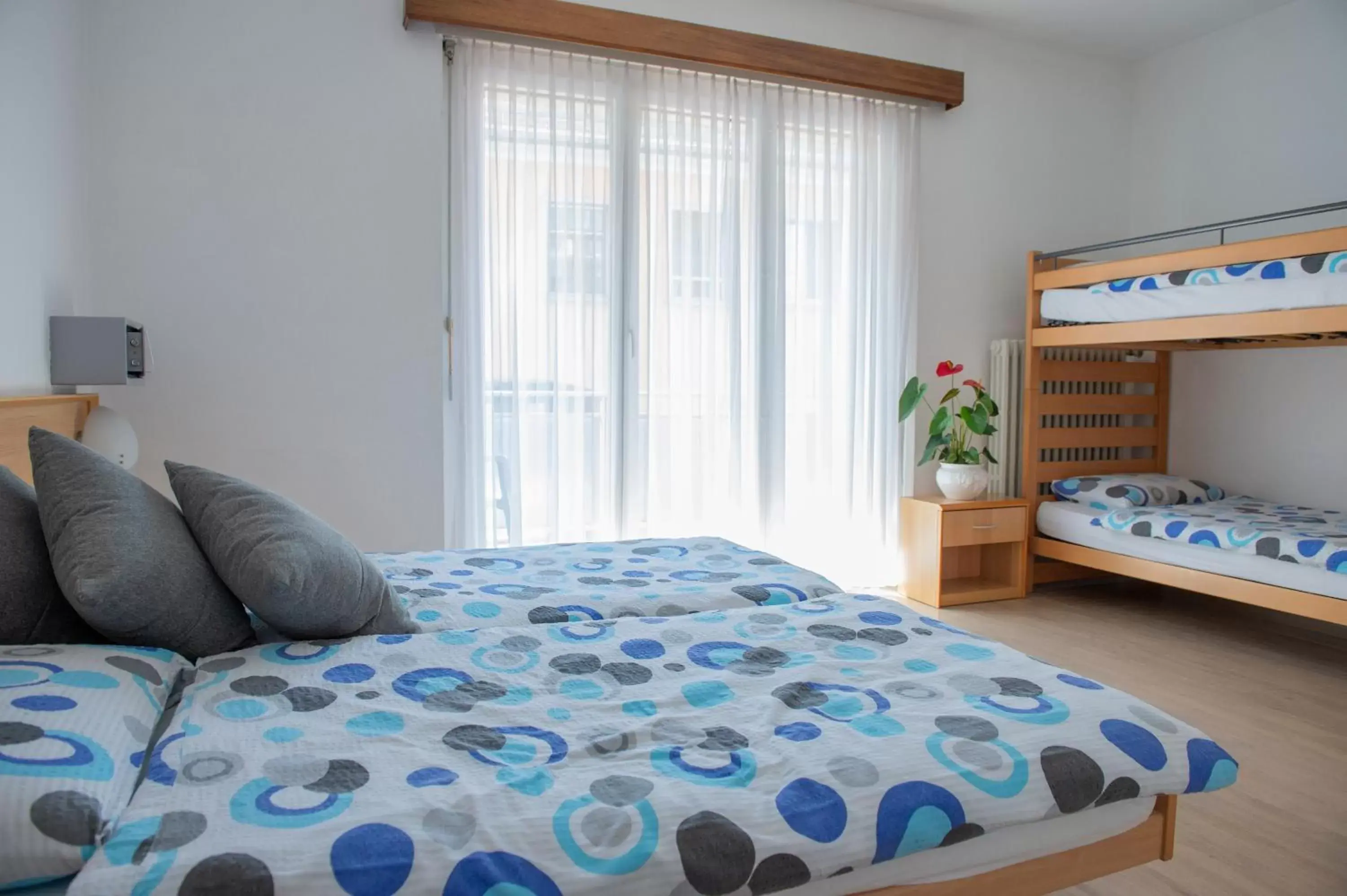 Quadruple Room with Shared Bathroom in Garni Moderno Quadruple Room with Shared Bathroom in Garni Moderno