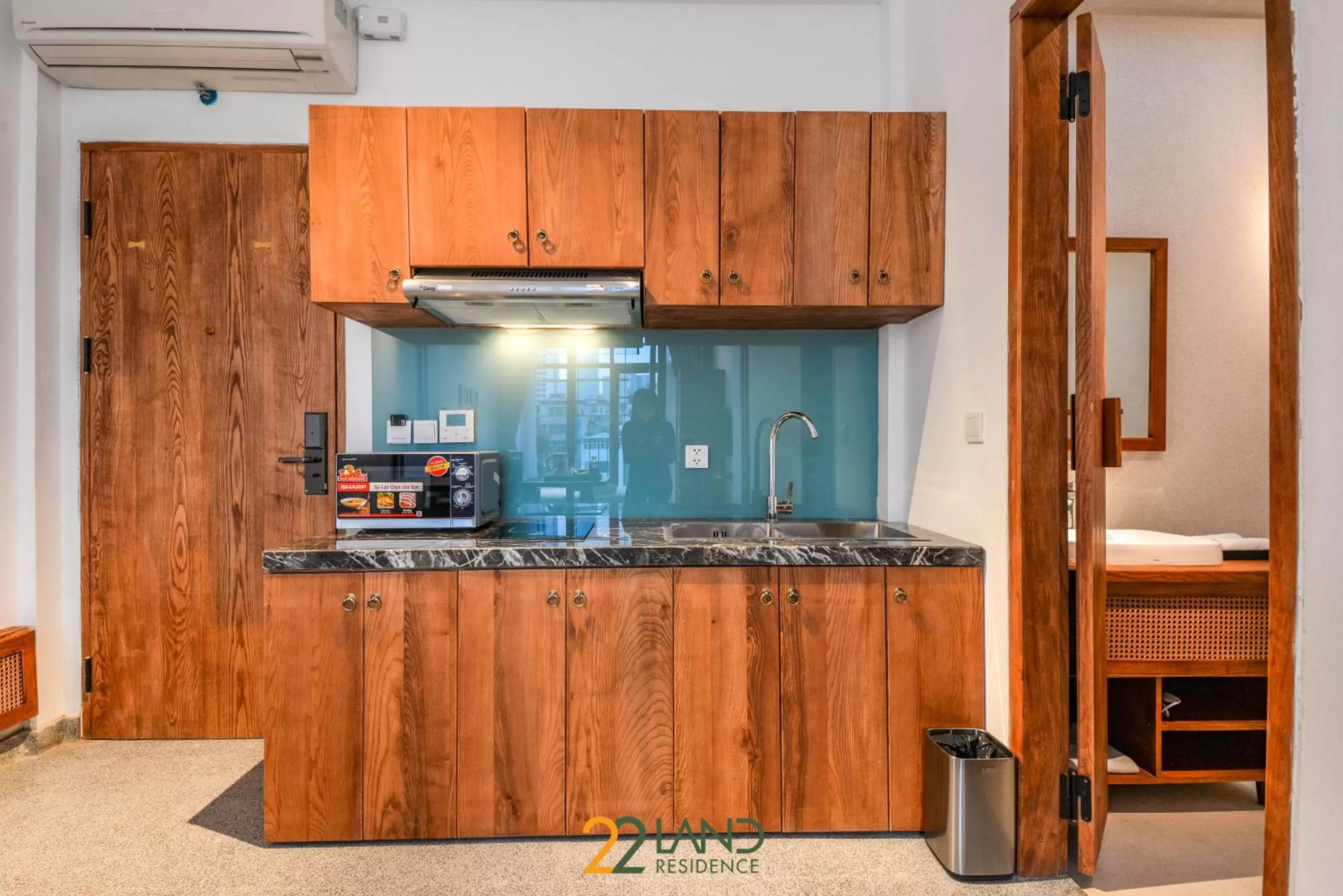 Kitchen or kitchenette in 22Land Hotel & Residence