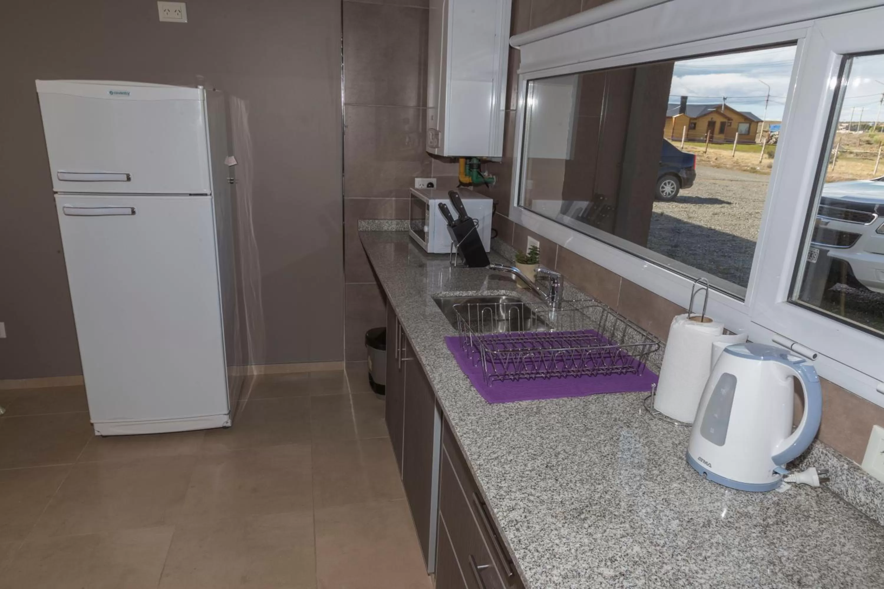 Kitchen or kitchenette in Tierra Tehuelche Hostería y Aparts