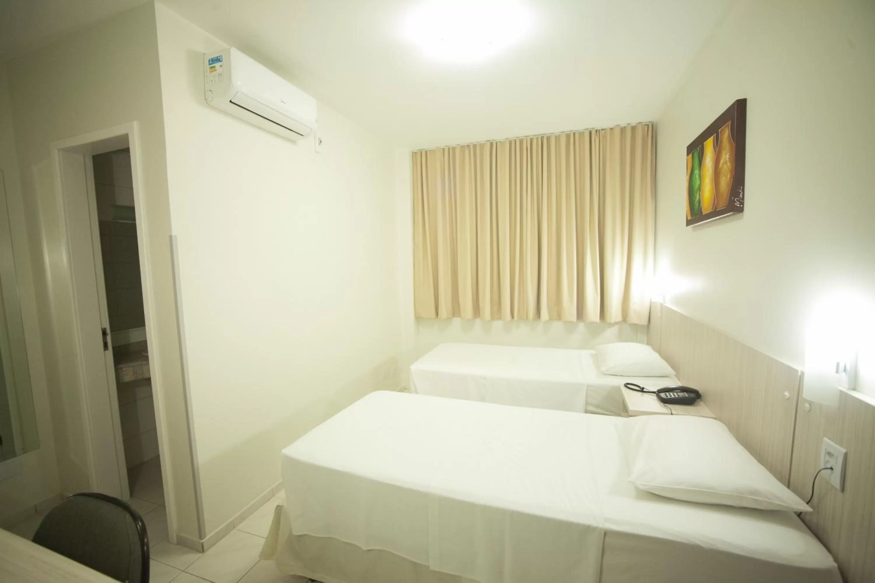 Bed in Hotel Itajaí Tur - Itajaí Navegantes