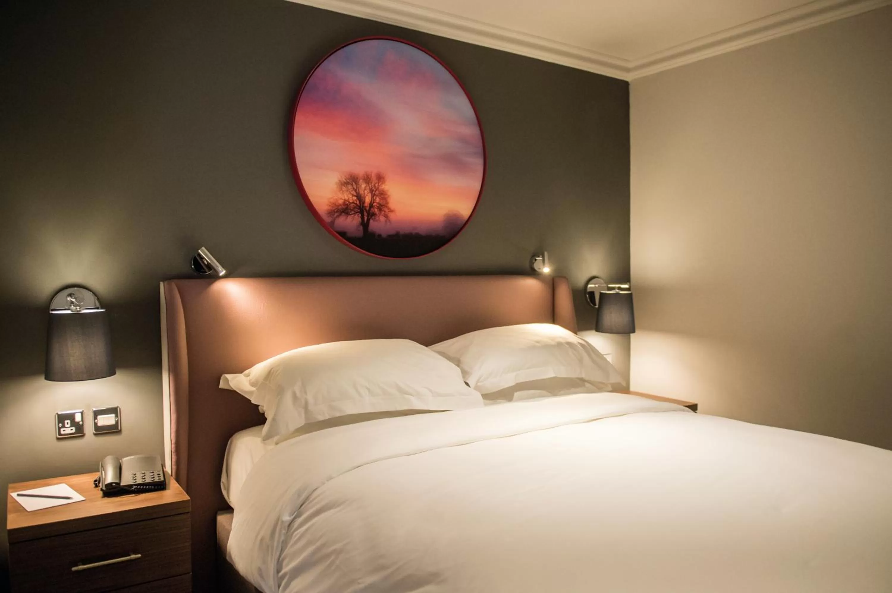 Bed in Cottons Hotel and Spa