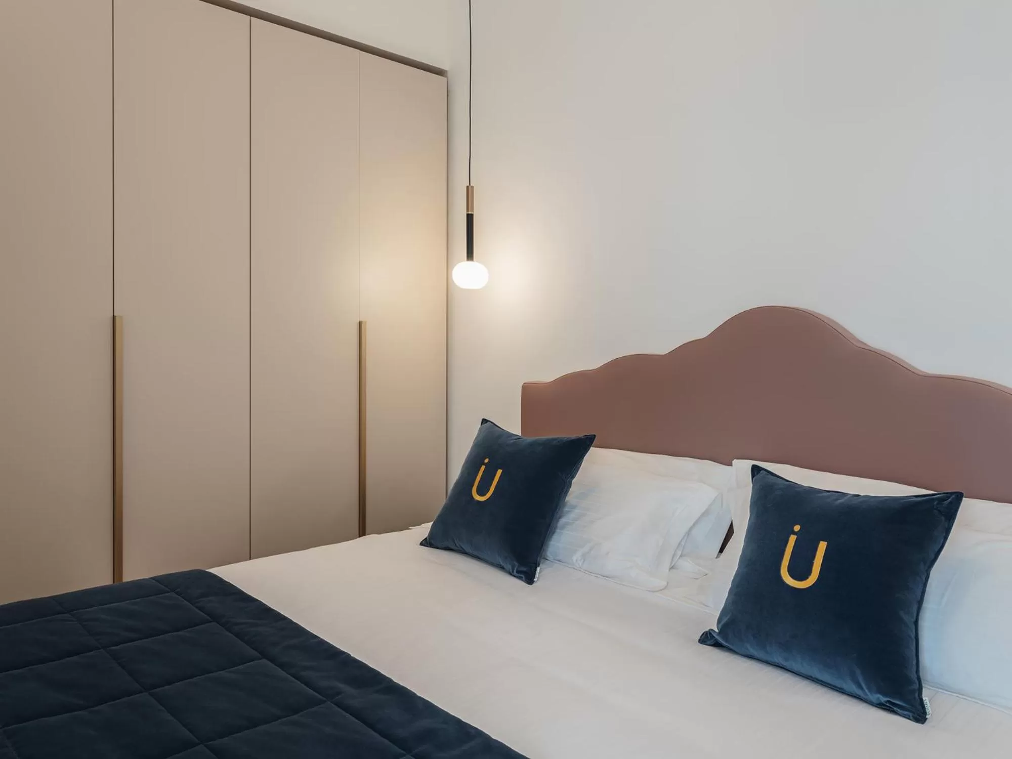 Bed in Living u HomeSuites