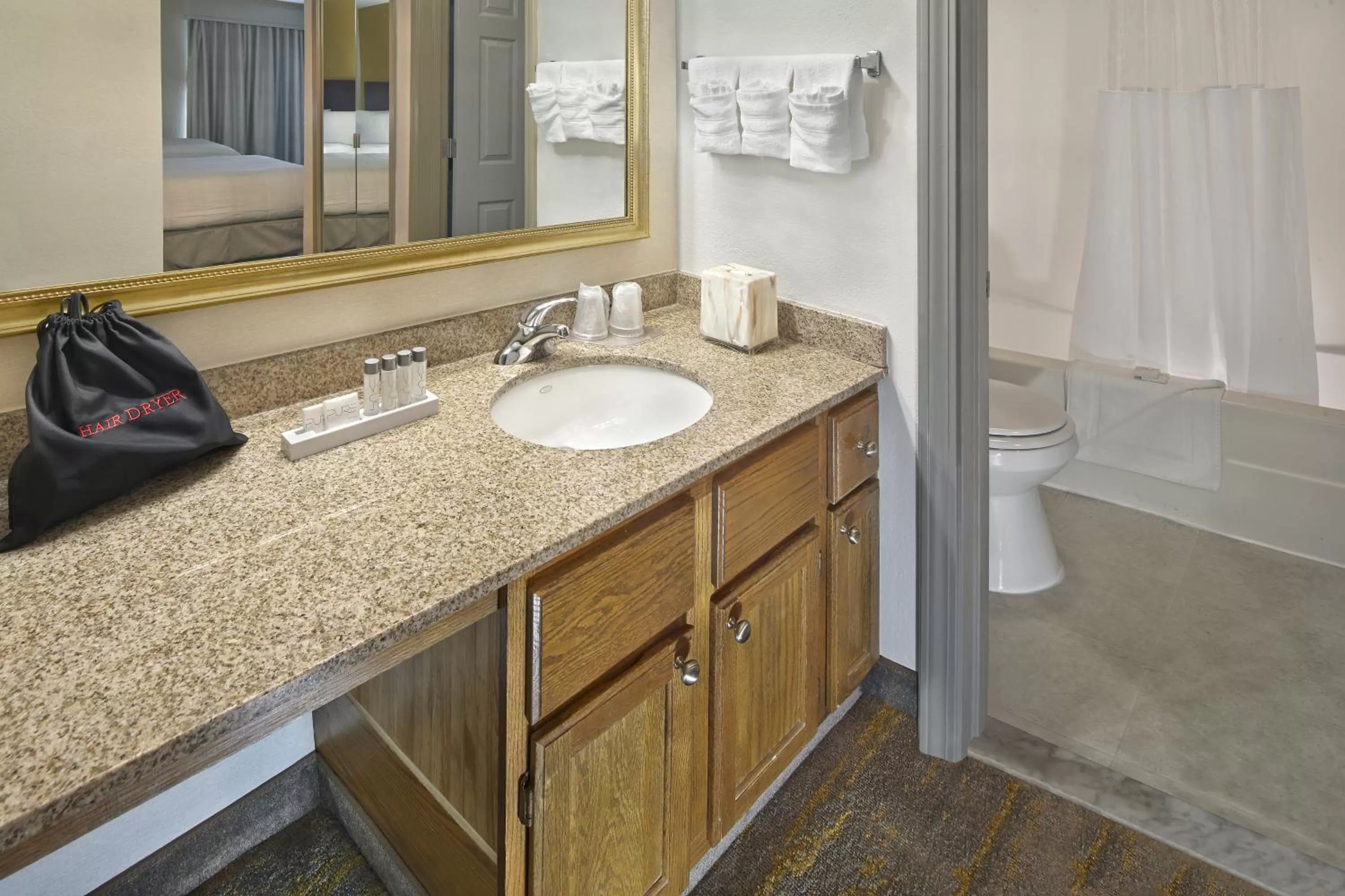 Bathroom in New Haven Village Suites