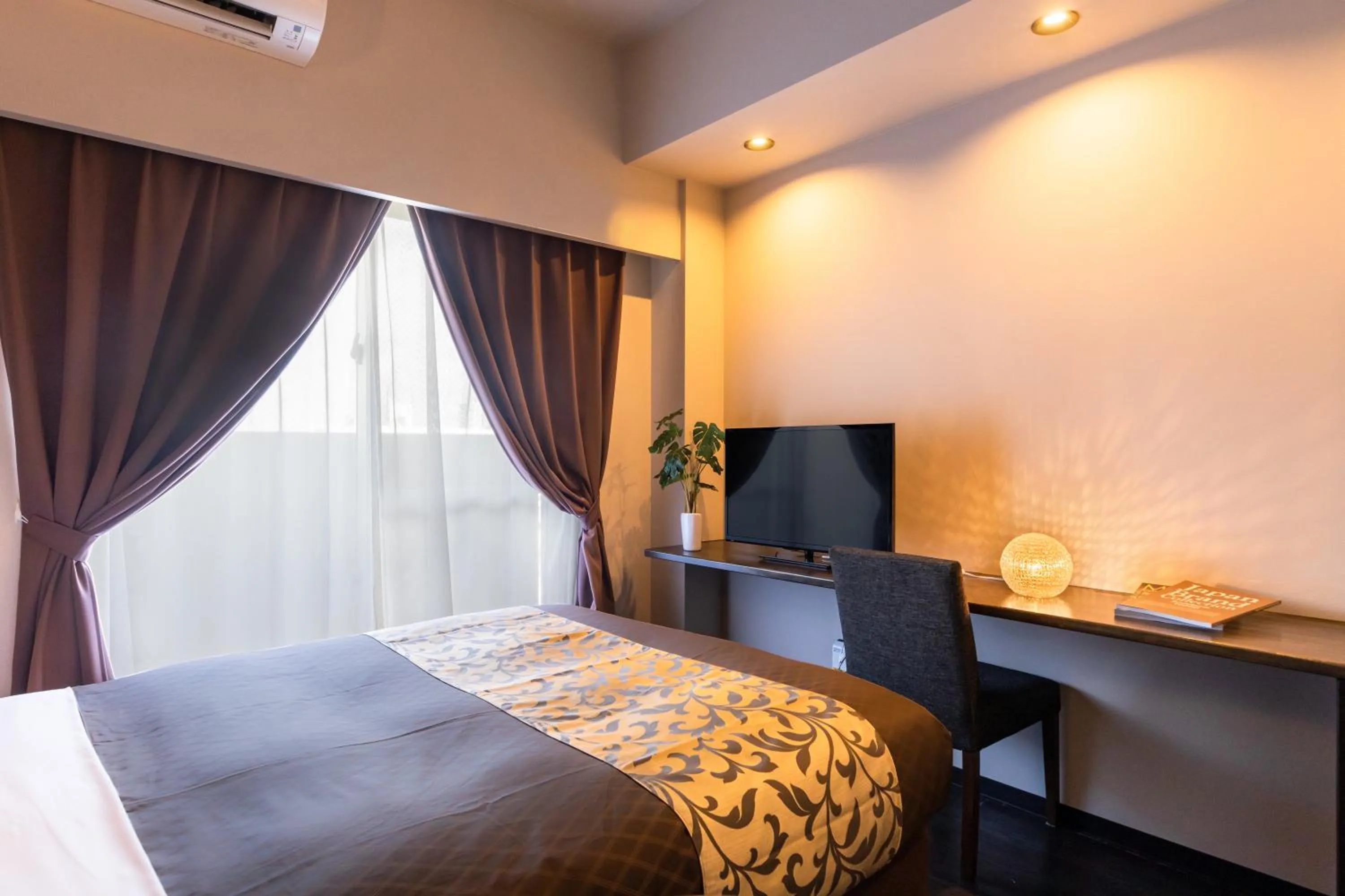 Bed in Mr.KINJO in SAKAEMACHI