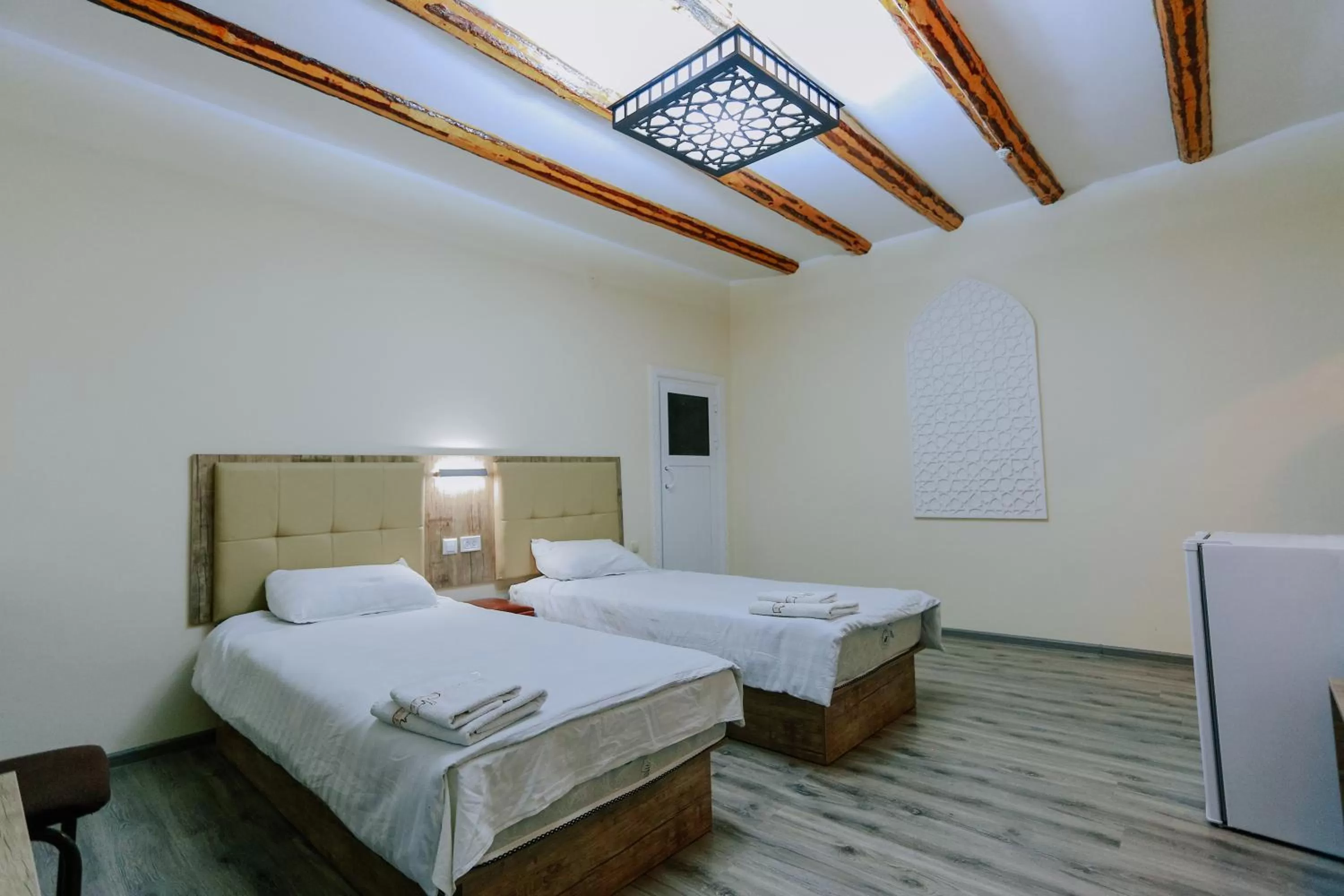 Photo of the whole room, Bed in Bukhara house hotel