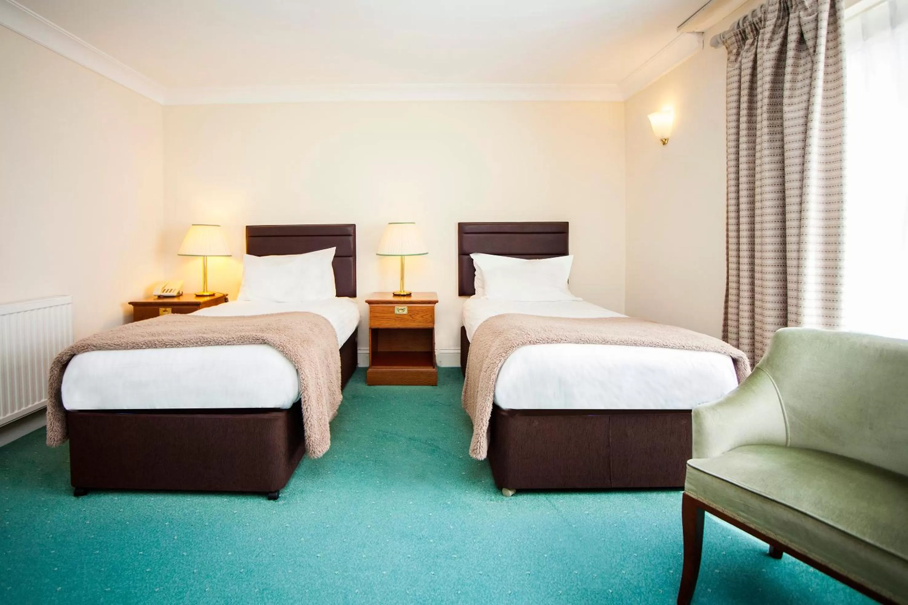 Bed in The Walnut Tree Hotel