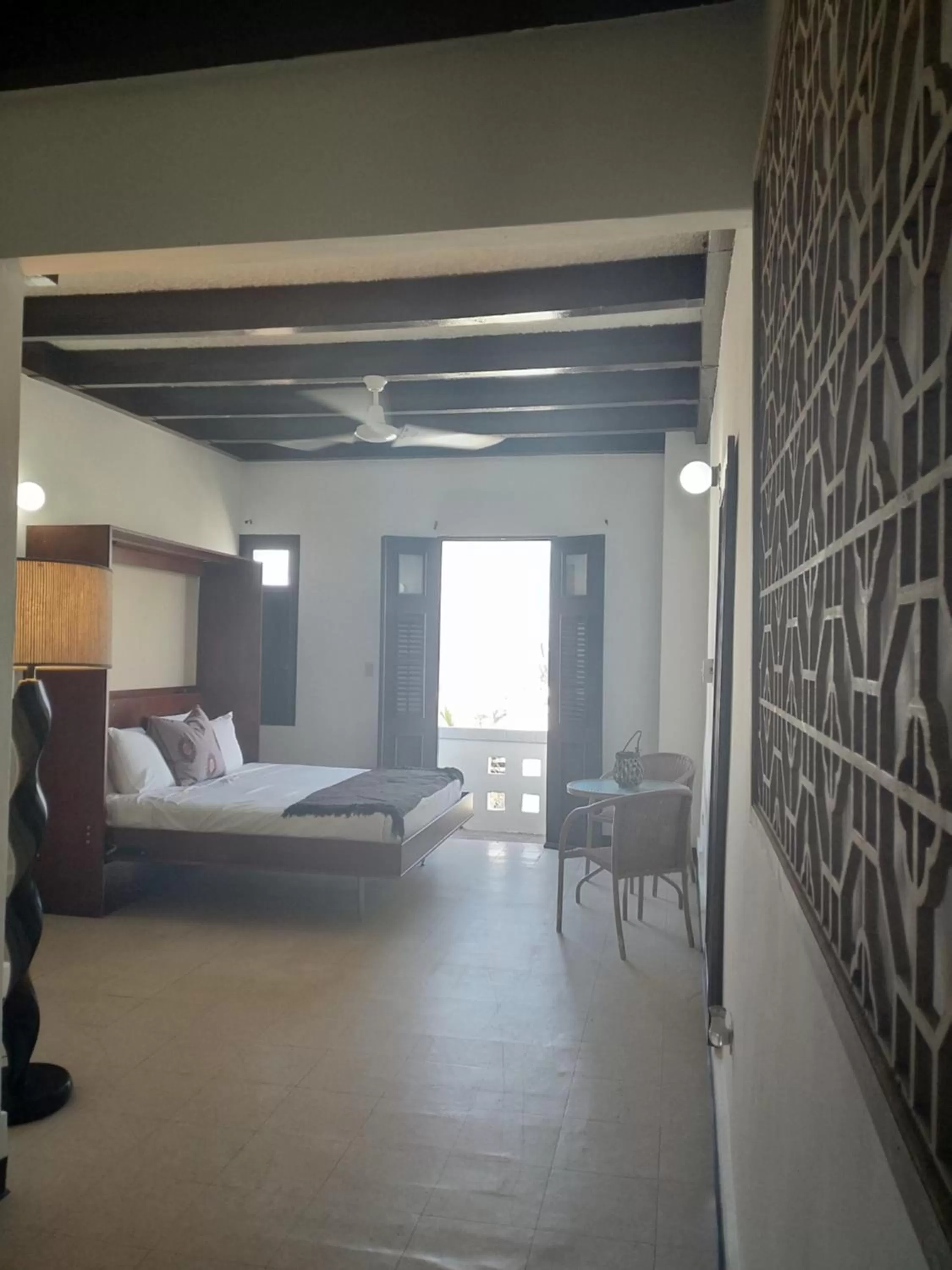 Seating area, Bed in La Capitana Old San Juan Building