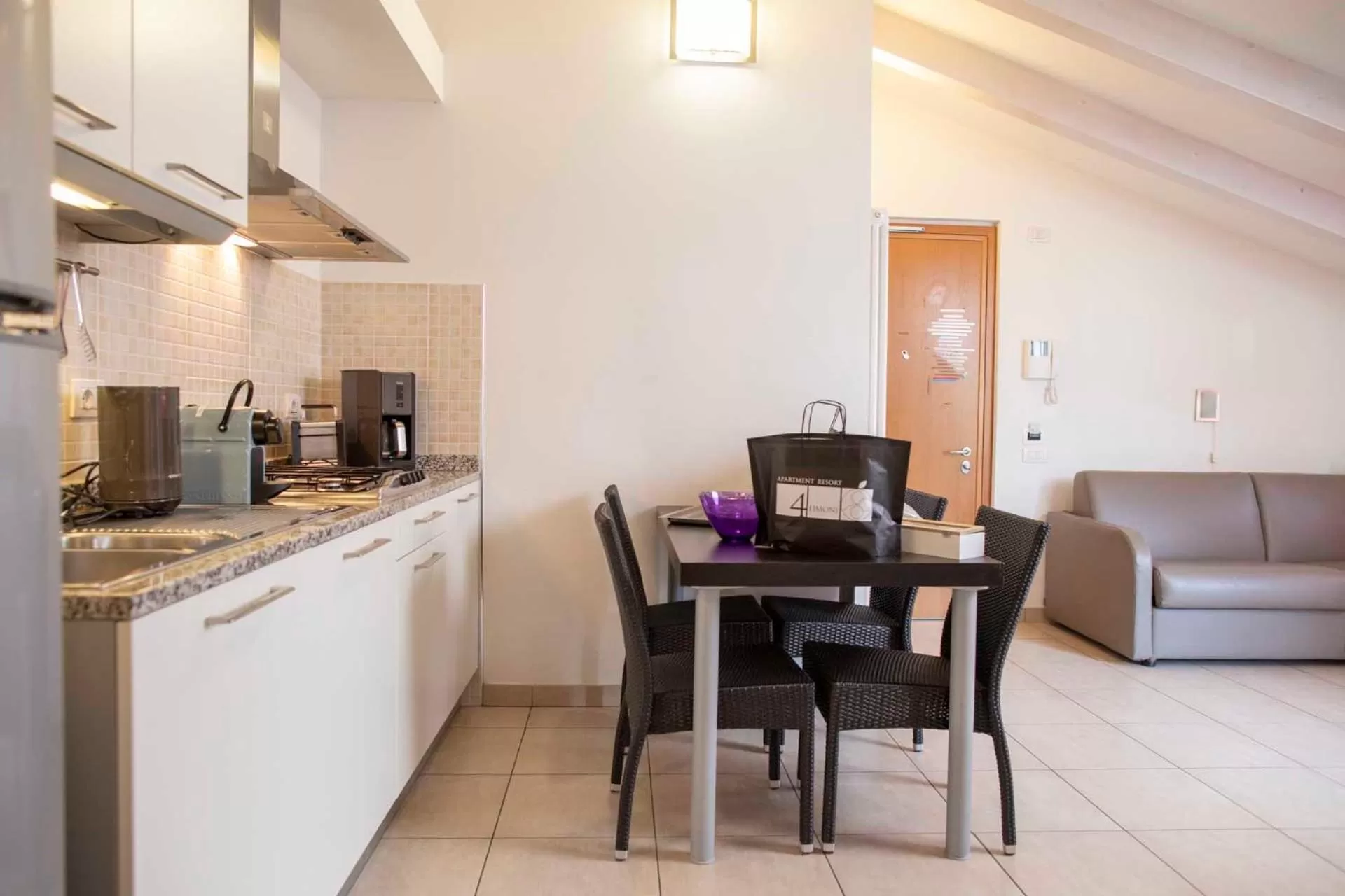 Kitchen or kitchenette in 4 Limoni Apartment Resort