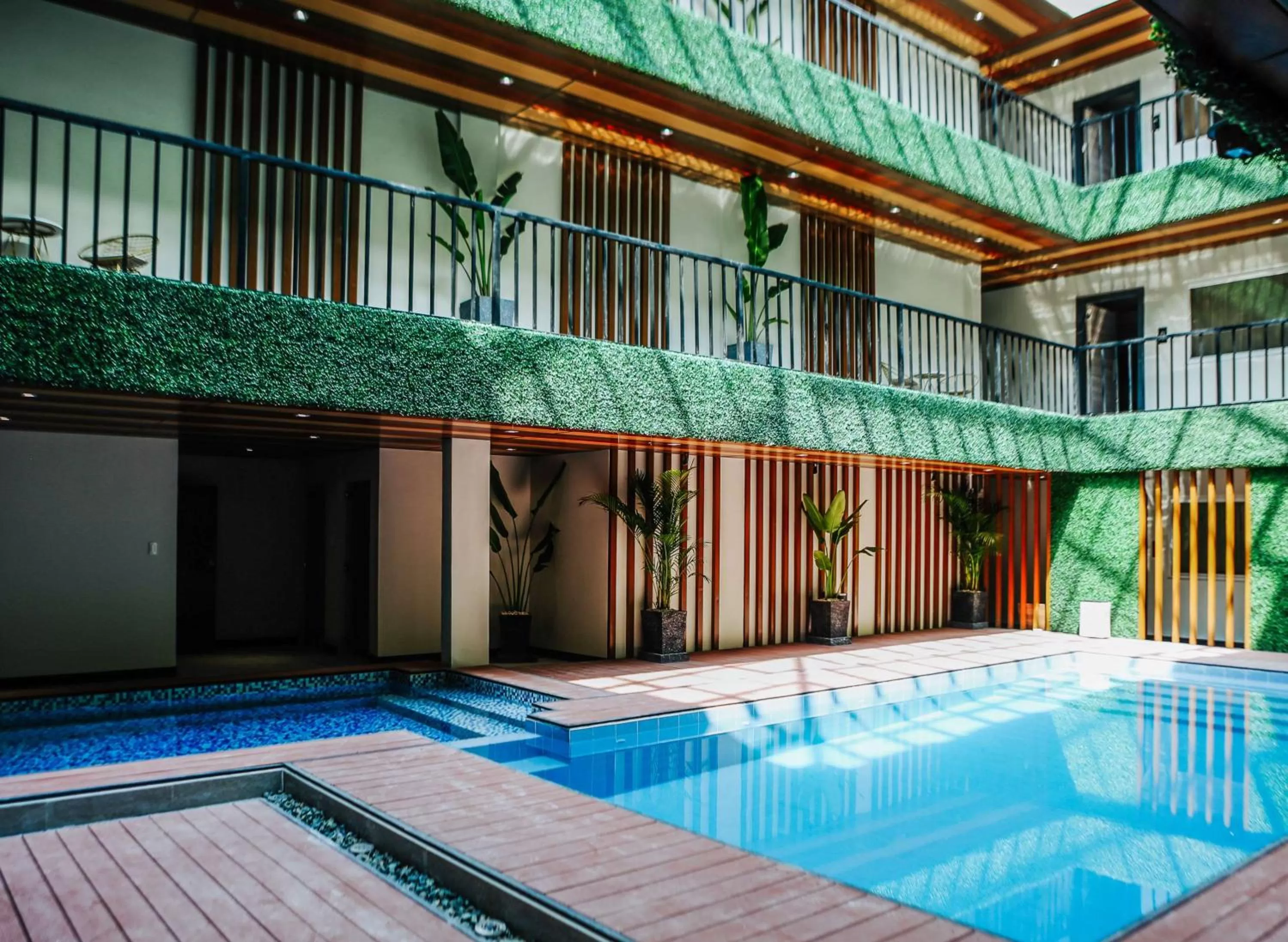 Swimming pool in SureStay Studio by Best Western Clarkview Angeles City