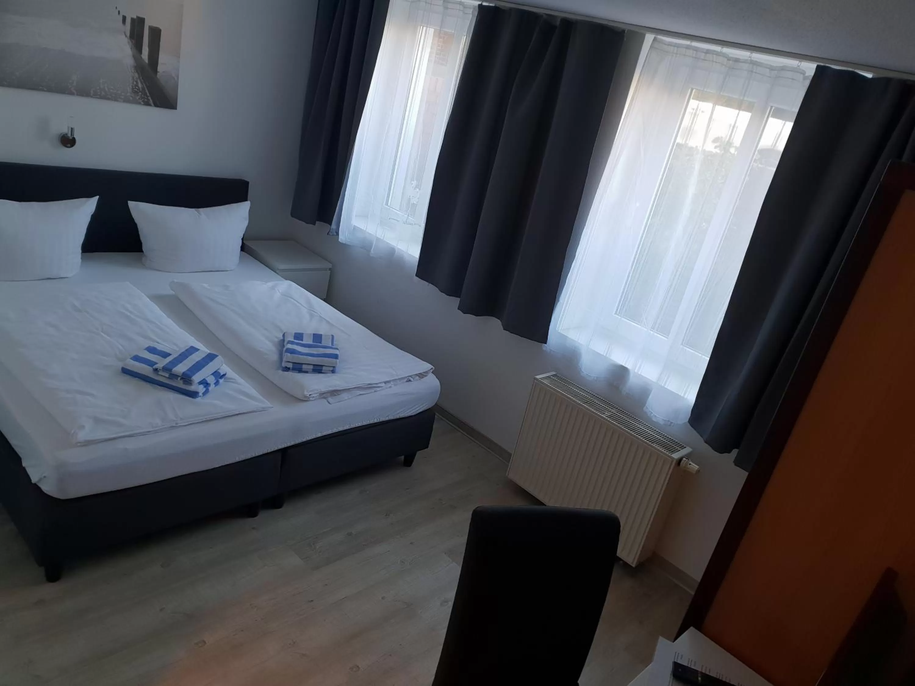 Bed in Appartement-Hotel Rostock
