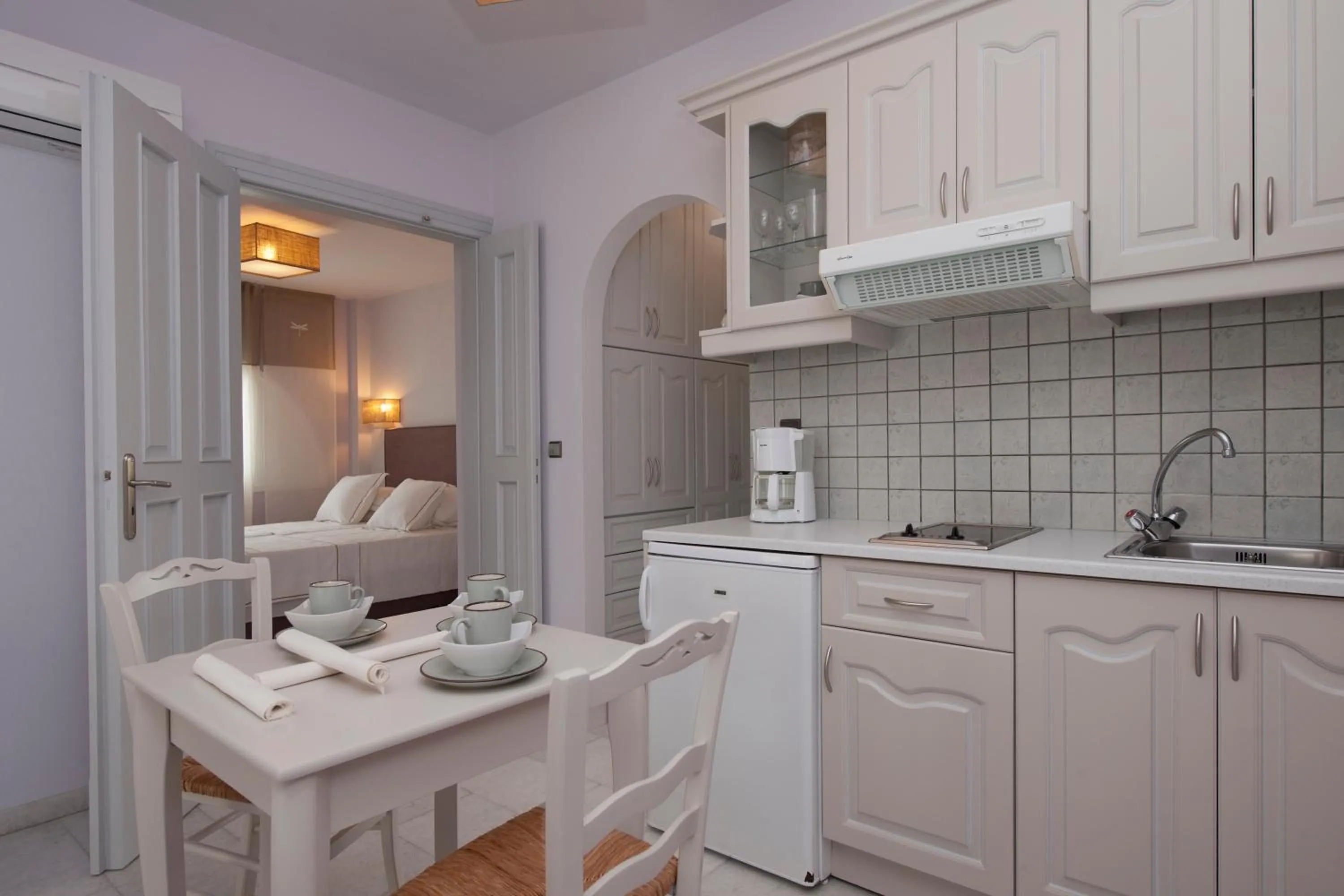 Kitchen or kitchenette in Ammos Naxos Exclusive Apartments & Studios