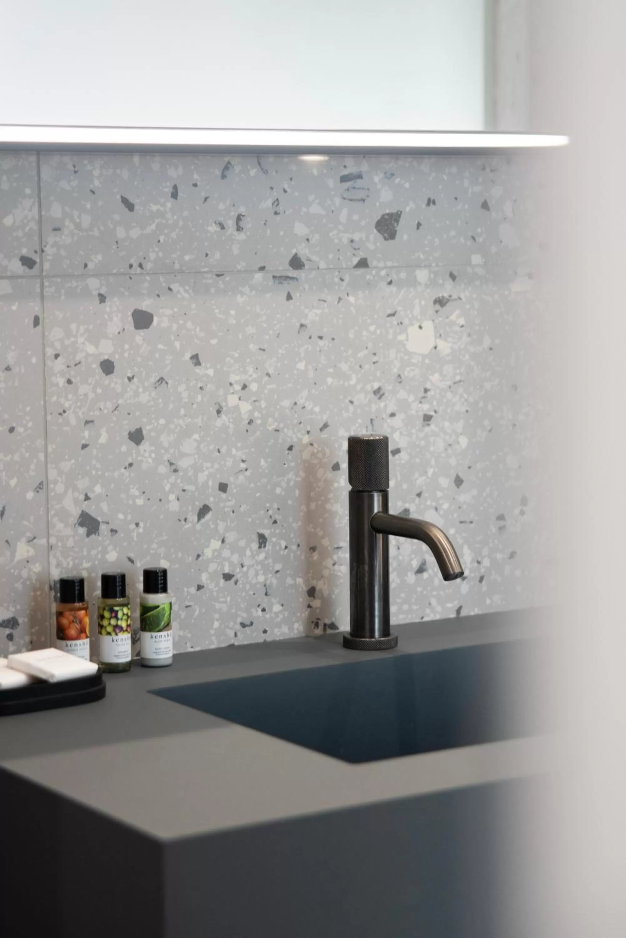 Bathroom in Lisetta Gardens Boutique & Suites