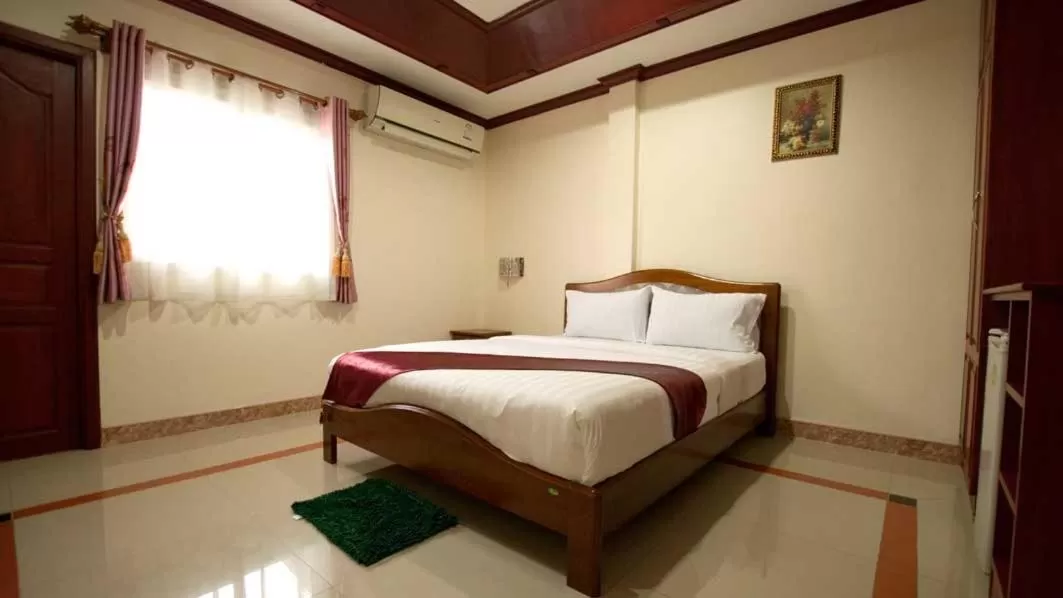 Bed in Bluebird Inn Pattaya