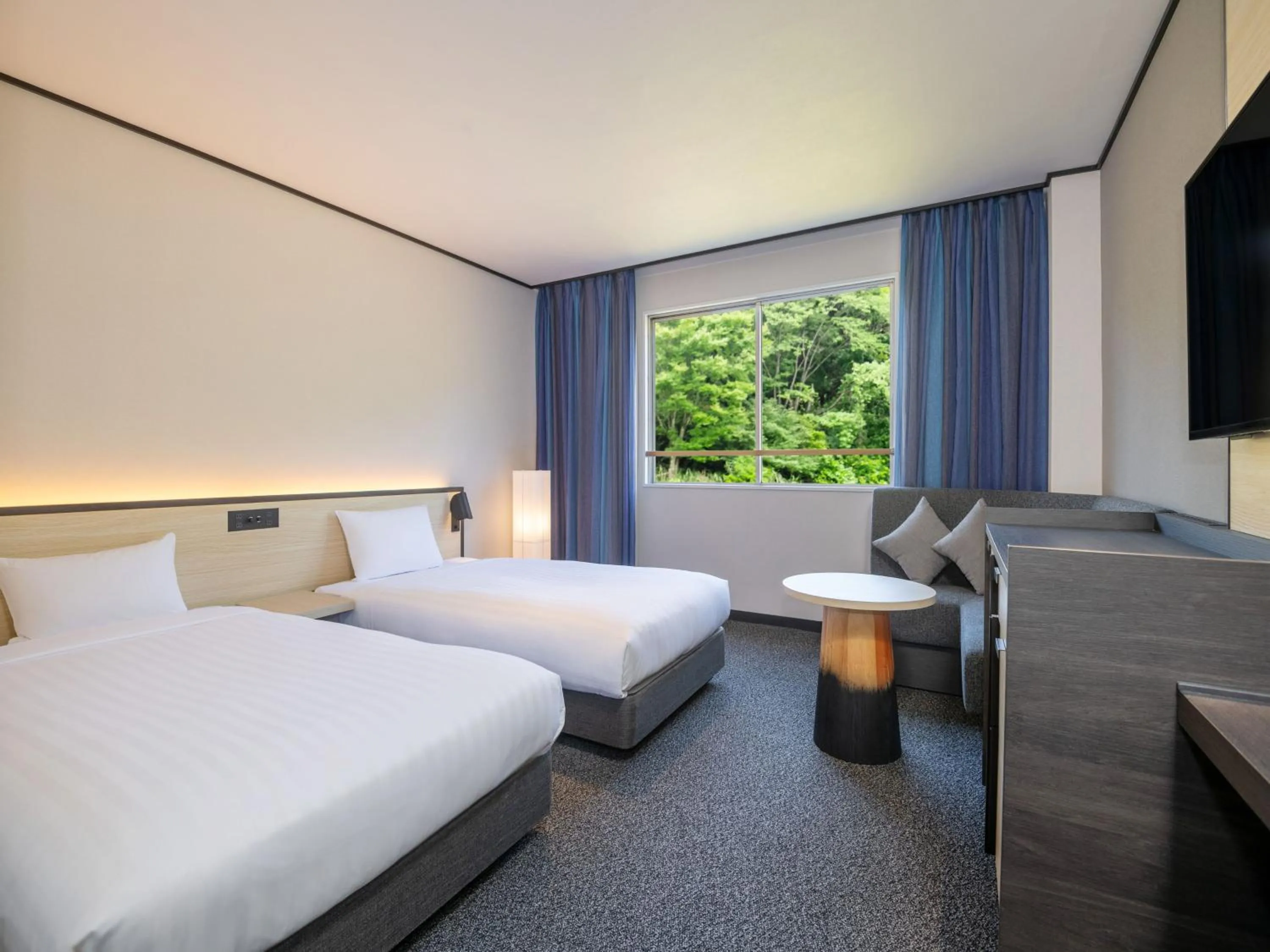 Photo of the whole room, Bed in Kirishima Kokusai Hotel