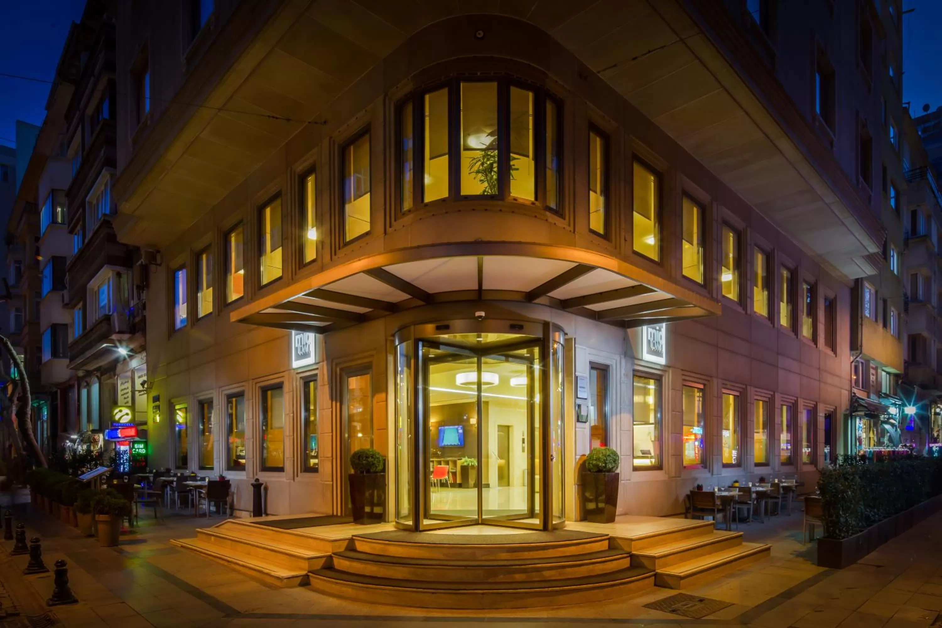 Property logo or sign in Midtown Hotel