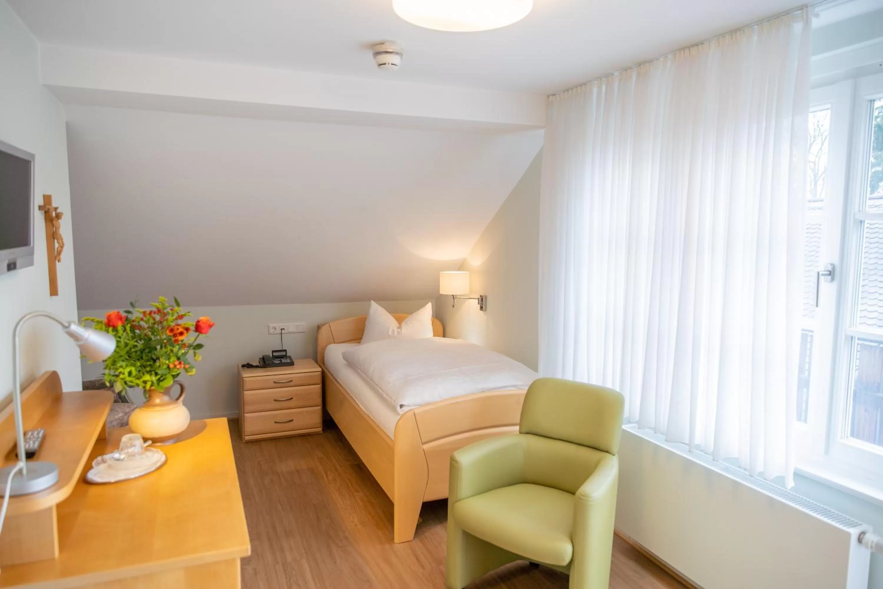 Living room, Bed in Gästehaus Sonnenhof