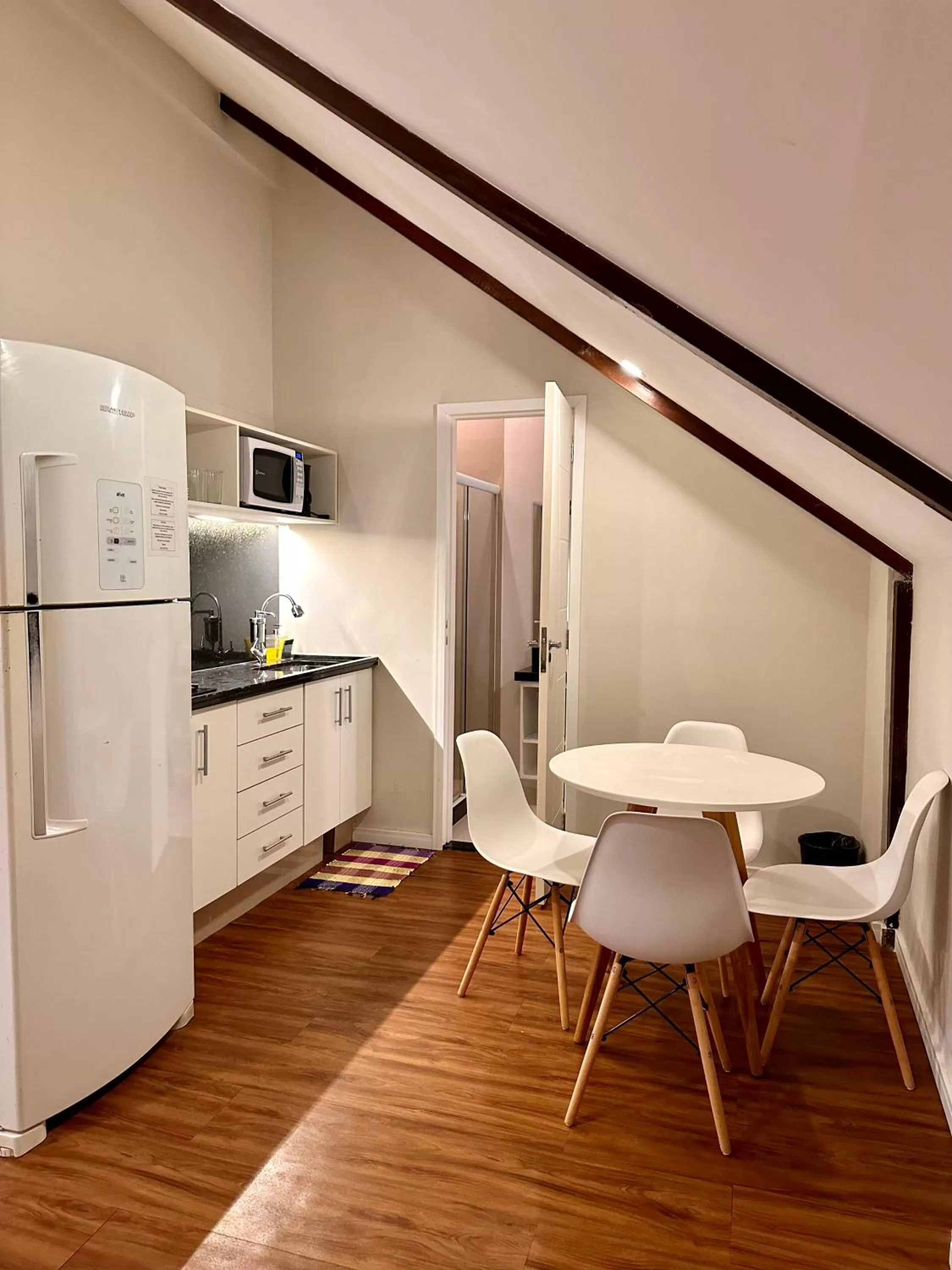 Kitchen or kitchenette in Injoy Suítes & Aparts