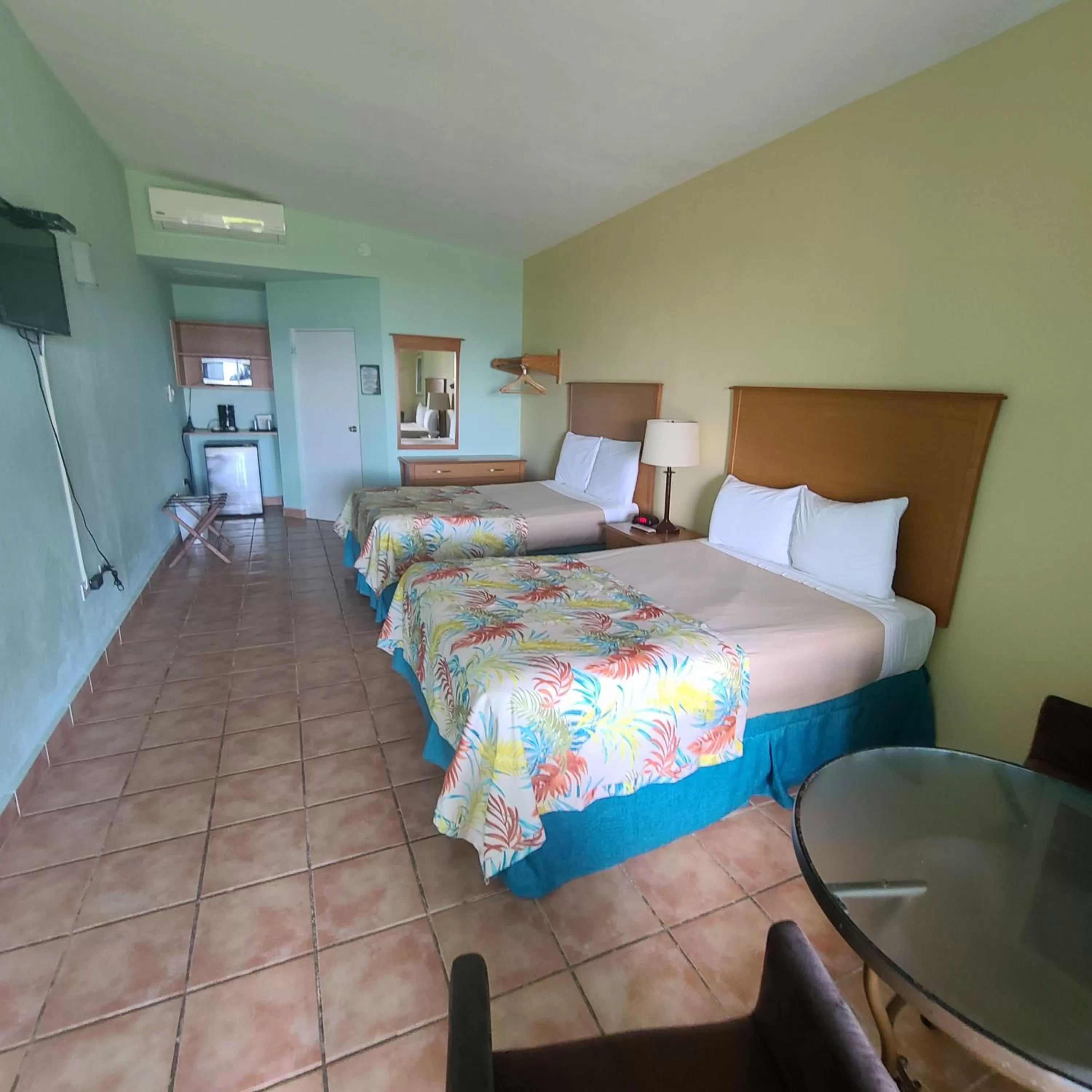 Photo of the whole room, Bed in Parador Maunacaribe - Maunabo