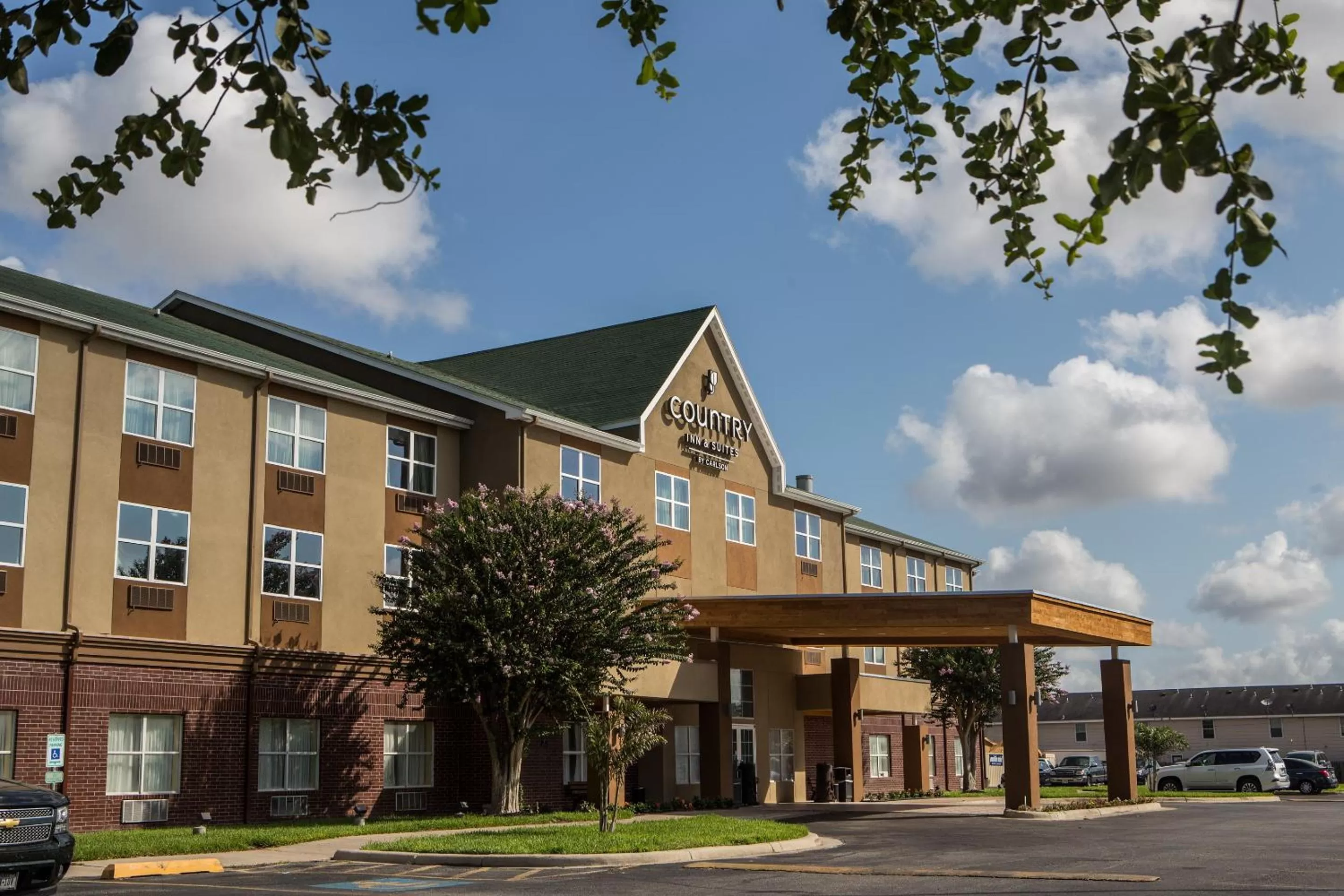 Property building in Country Inn & Suites by Radisson, Harlingen, TX