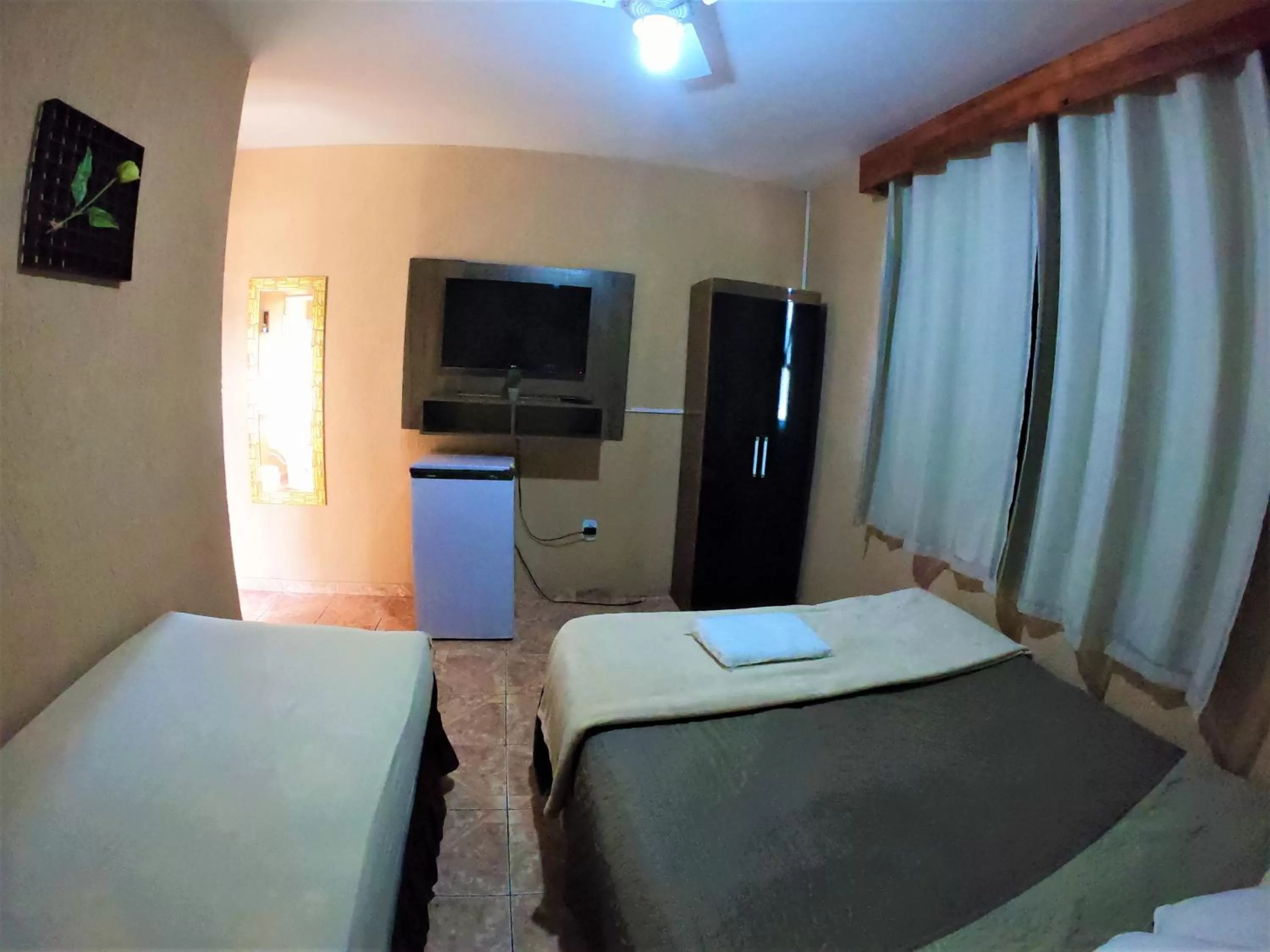 Bed in Pousada Do Pancho