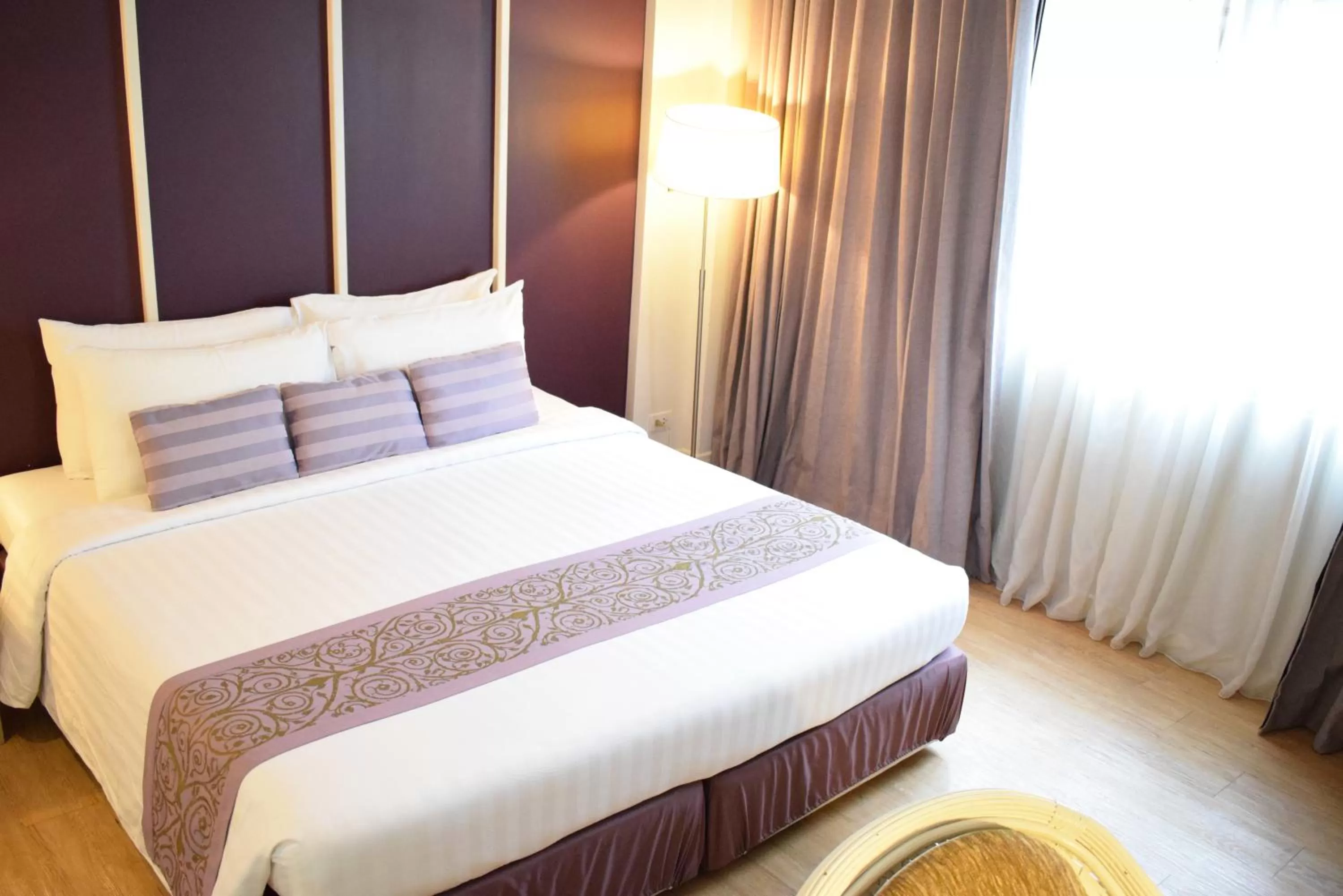 Bed in Trang Hotel Bangkok - SHA Plus