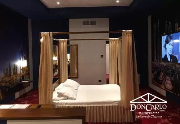 Bed in Hotel Don Carlo