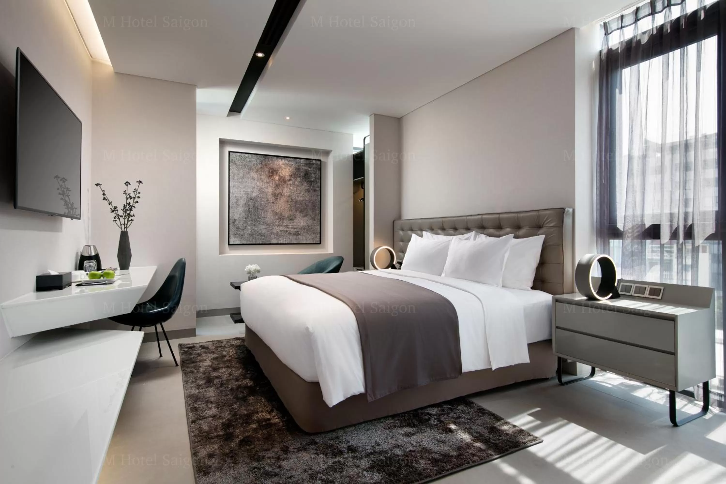 Photo of the whole room, Bed in M Hotel Saigon