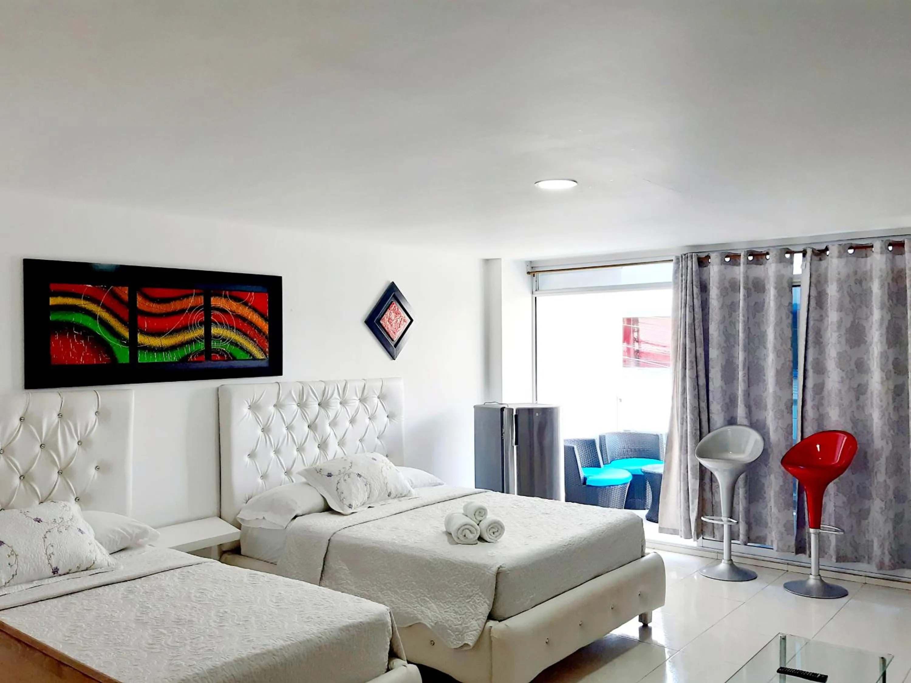 Photo of the whole room, Bed in Blue Emerald Inn