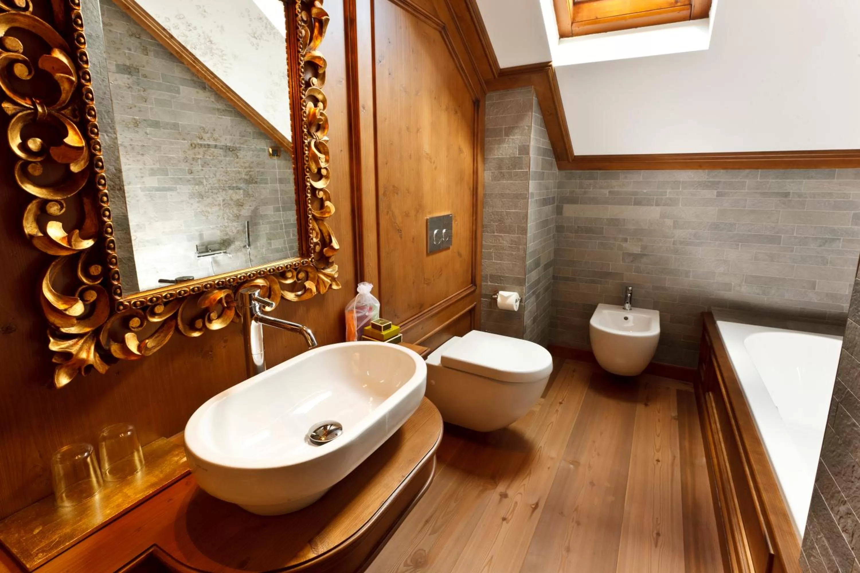 Bathroom in Ambra Cortina Luxury&Fashion Hotel