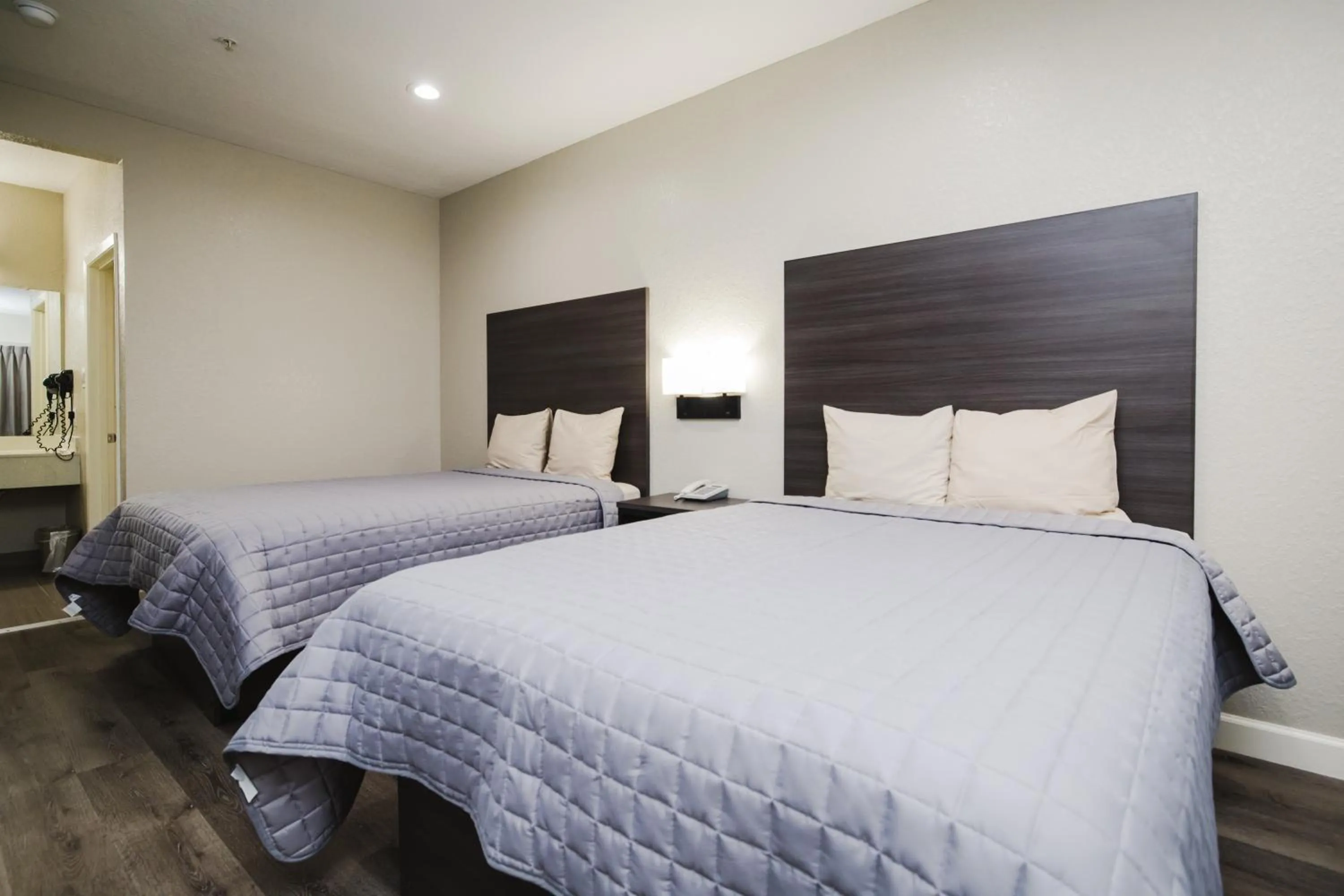 Bed in Winchester Inn and Suites Humble/IAH/North Houston