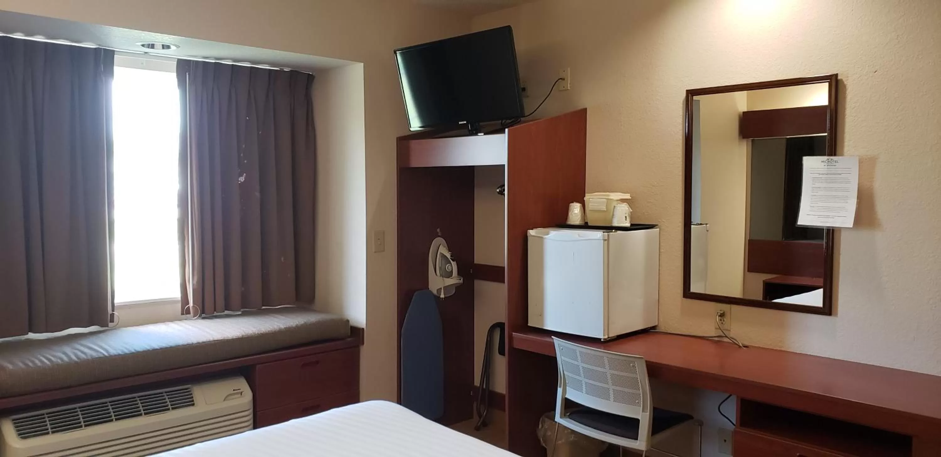 Bed in Microtel Inn & Suites by Wyndham Wellsville