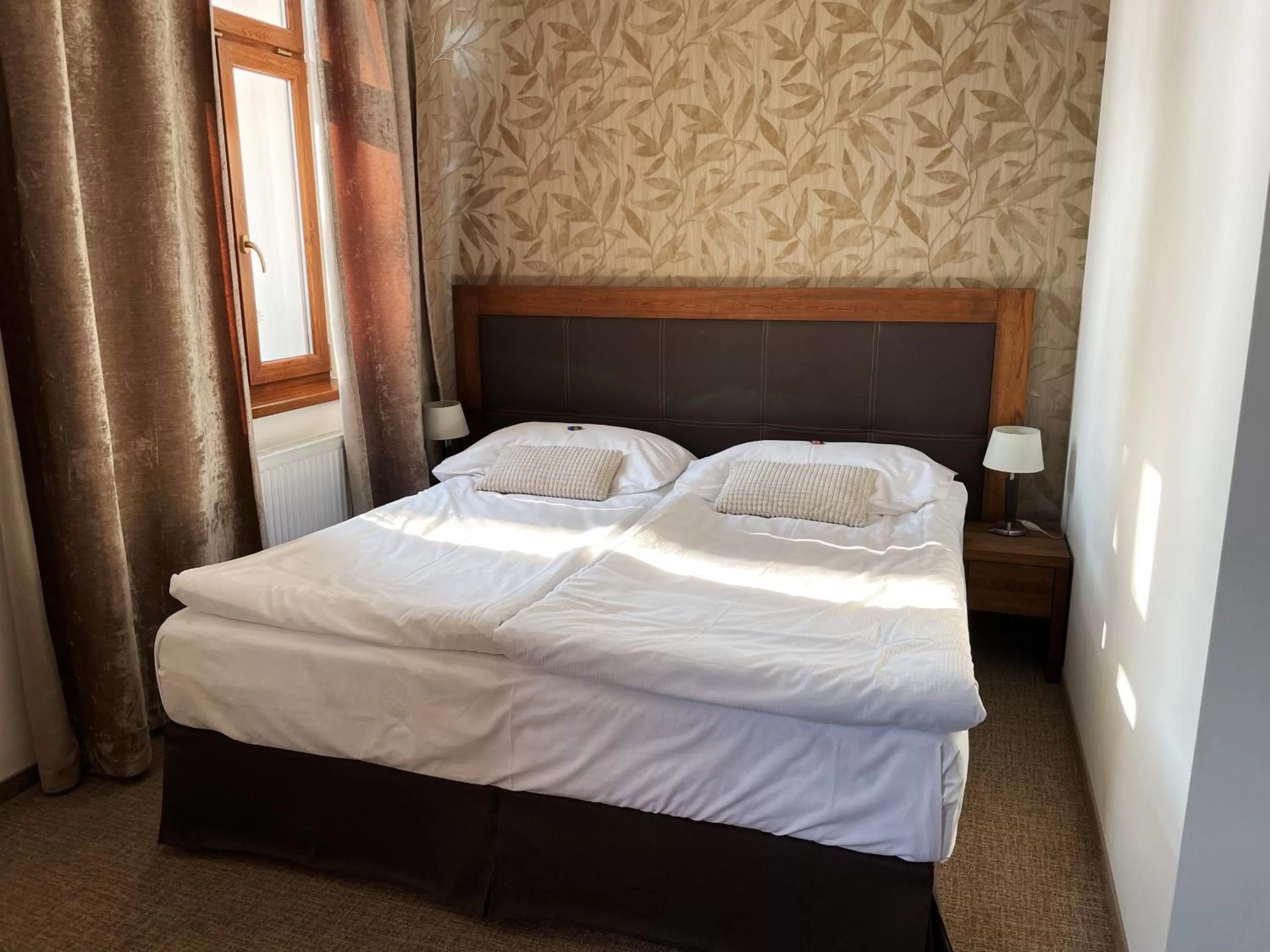 Bed in Hotel U Kvapilů