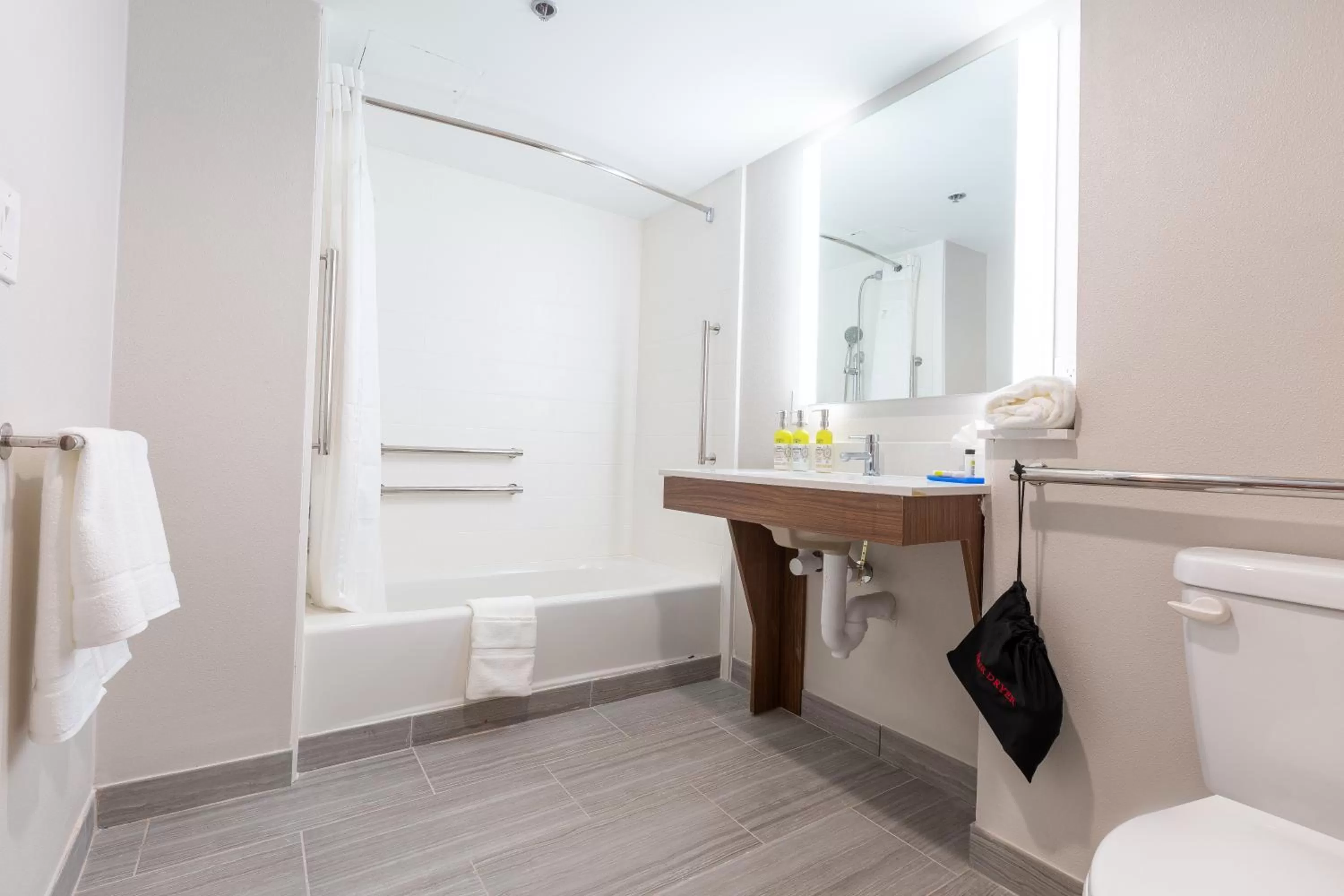Bathroom in Holiday Inn Express & Suites Arlington North – Stadium Area by IHG