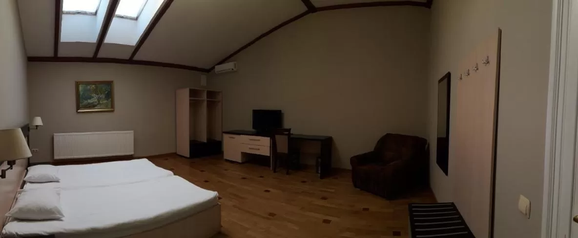 TV/Entertainment Center in Mini-Hotel Under The Roof