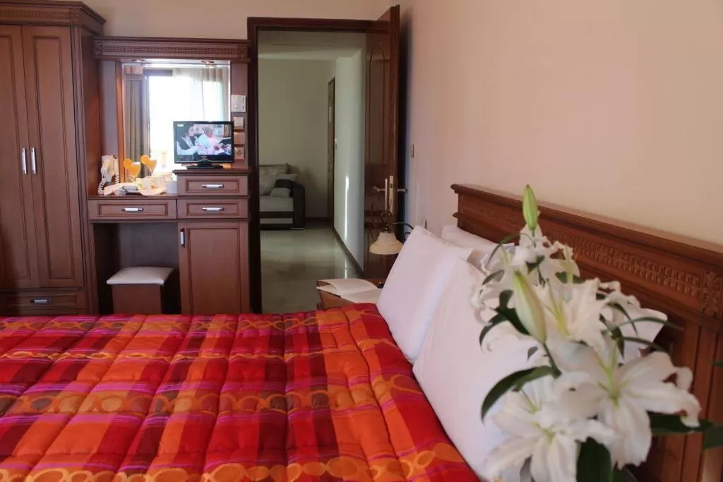 Bed in Famissi Hotel