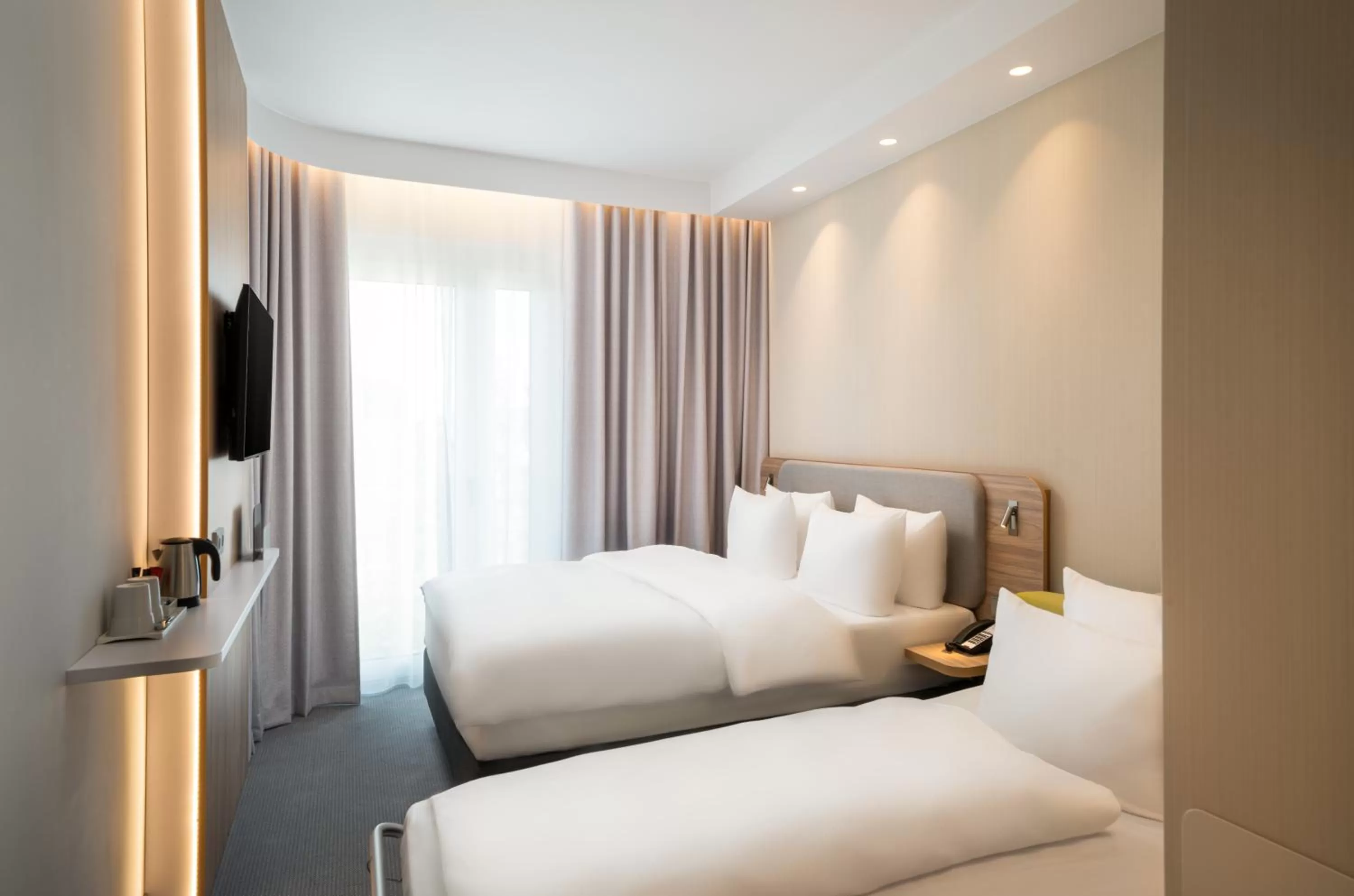 Bedroom, Bed in Holiday Inn Express - Rosenheim by IHG