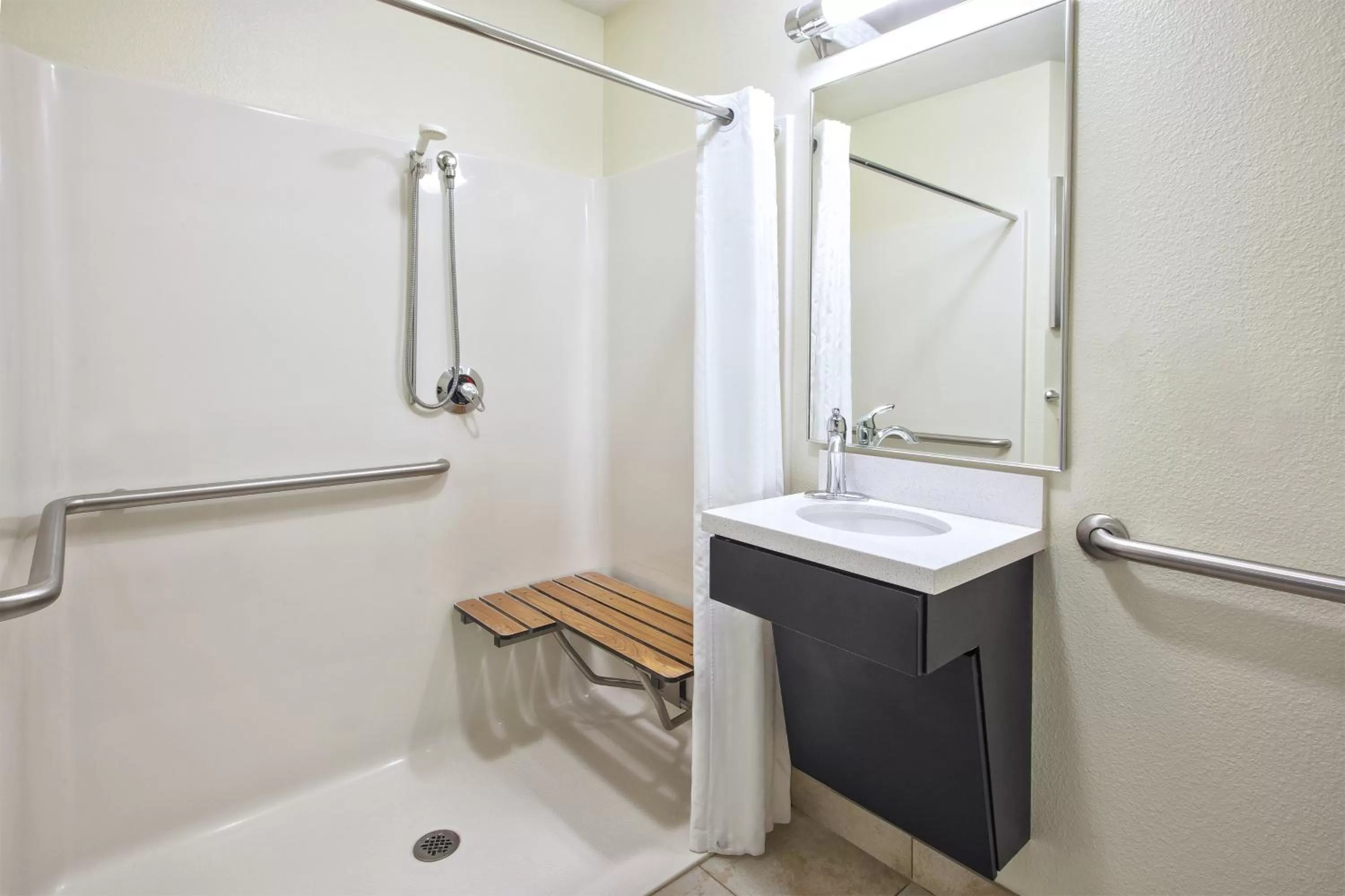 Queen Studio Suite with Roll in Shower in Candlewood Suites Indianapolis Airport by IHG