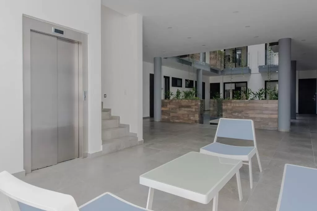 Seating area in Homely Studio or OneBR in Playa del Carmen w Balcony, BBQ, Pool Infinite, AC, TV Smart, 60mb