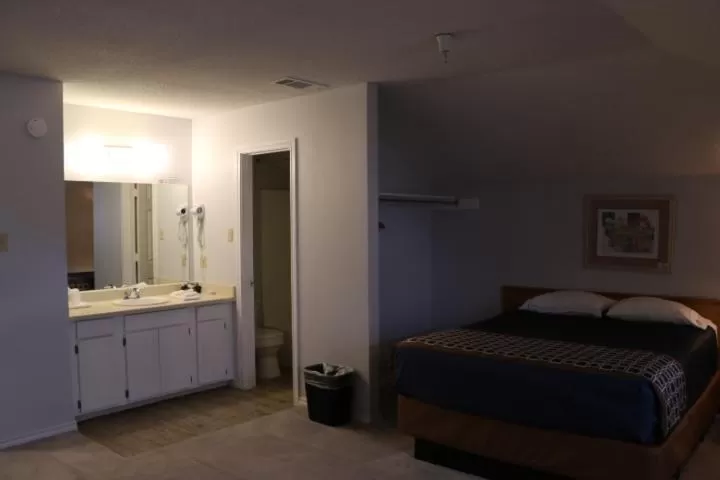 Bed in Bent Tree Motel