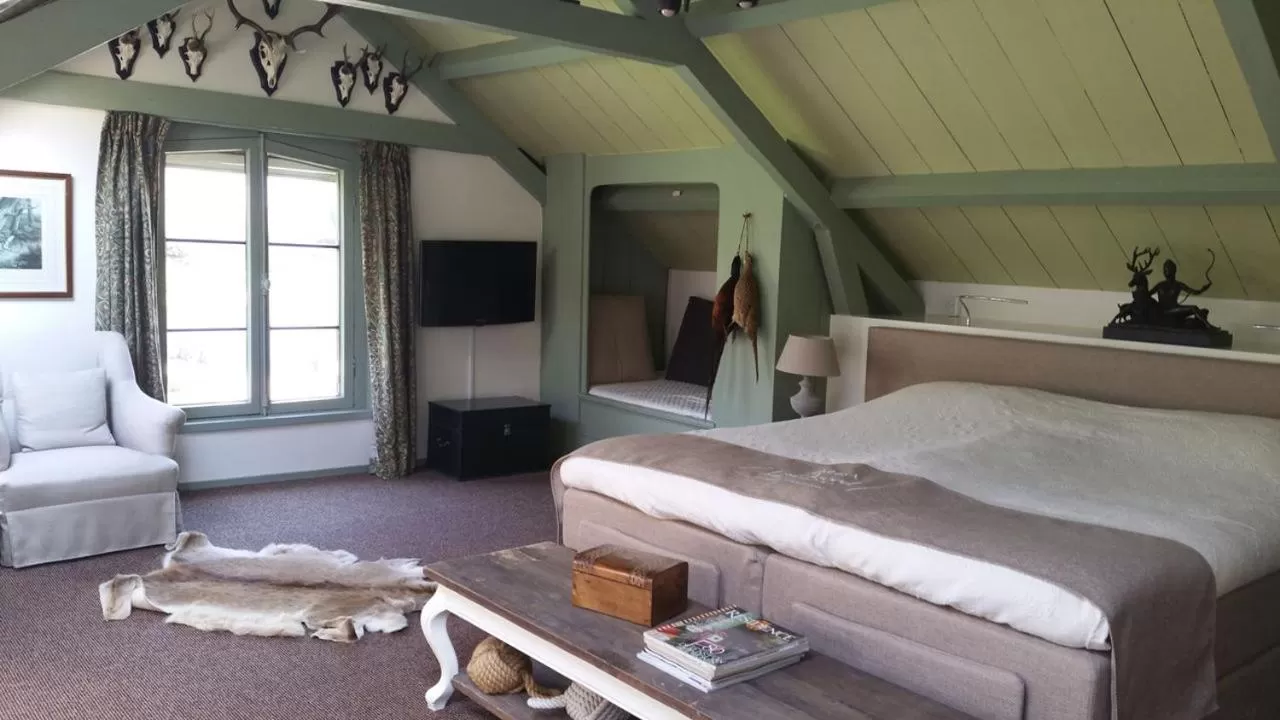 Bed in B&B en SPA Landgoed Matanze