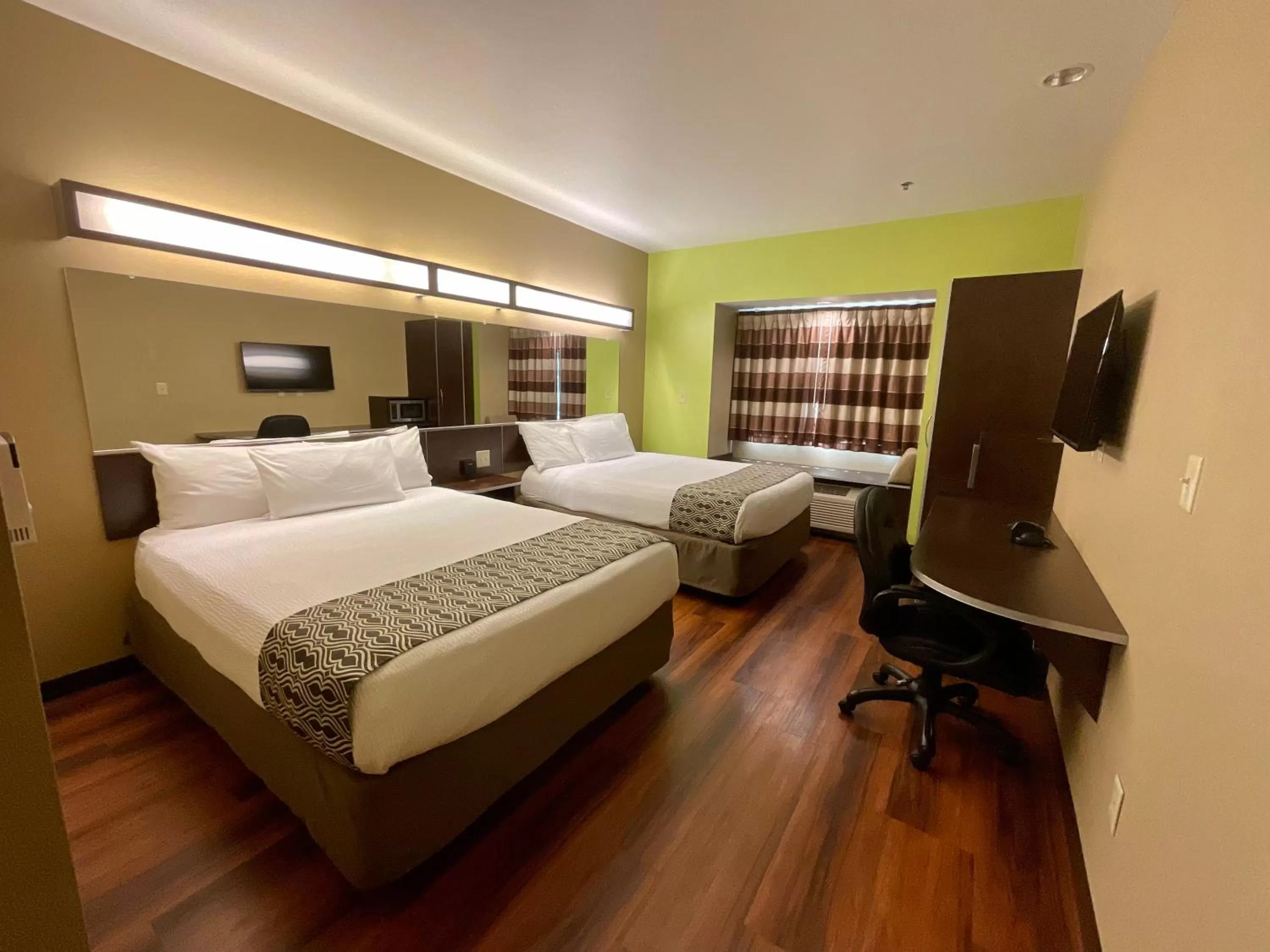 Bed in SureStay Plus Hotel by Best Western Buckhannon