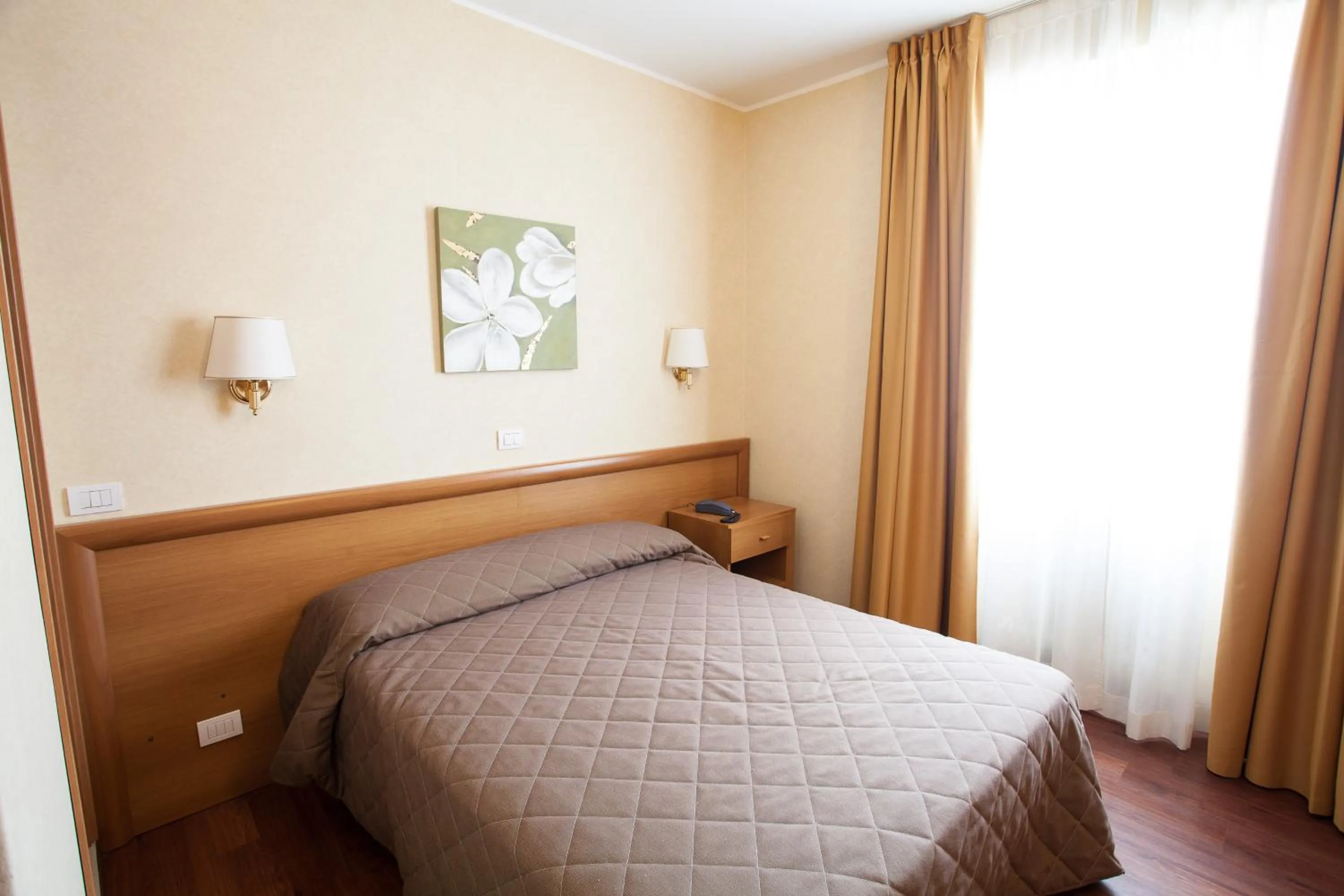 Bed in Hotel Esperia